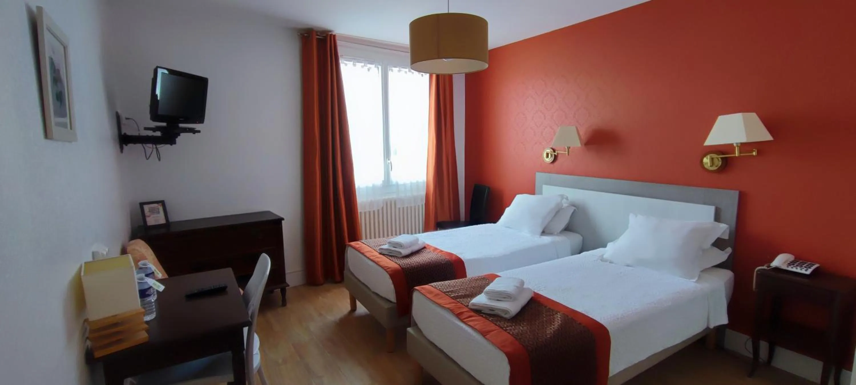 Photo of the whole room, Bed in Logis Grand Hotel Pelisson