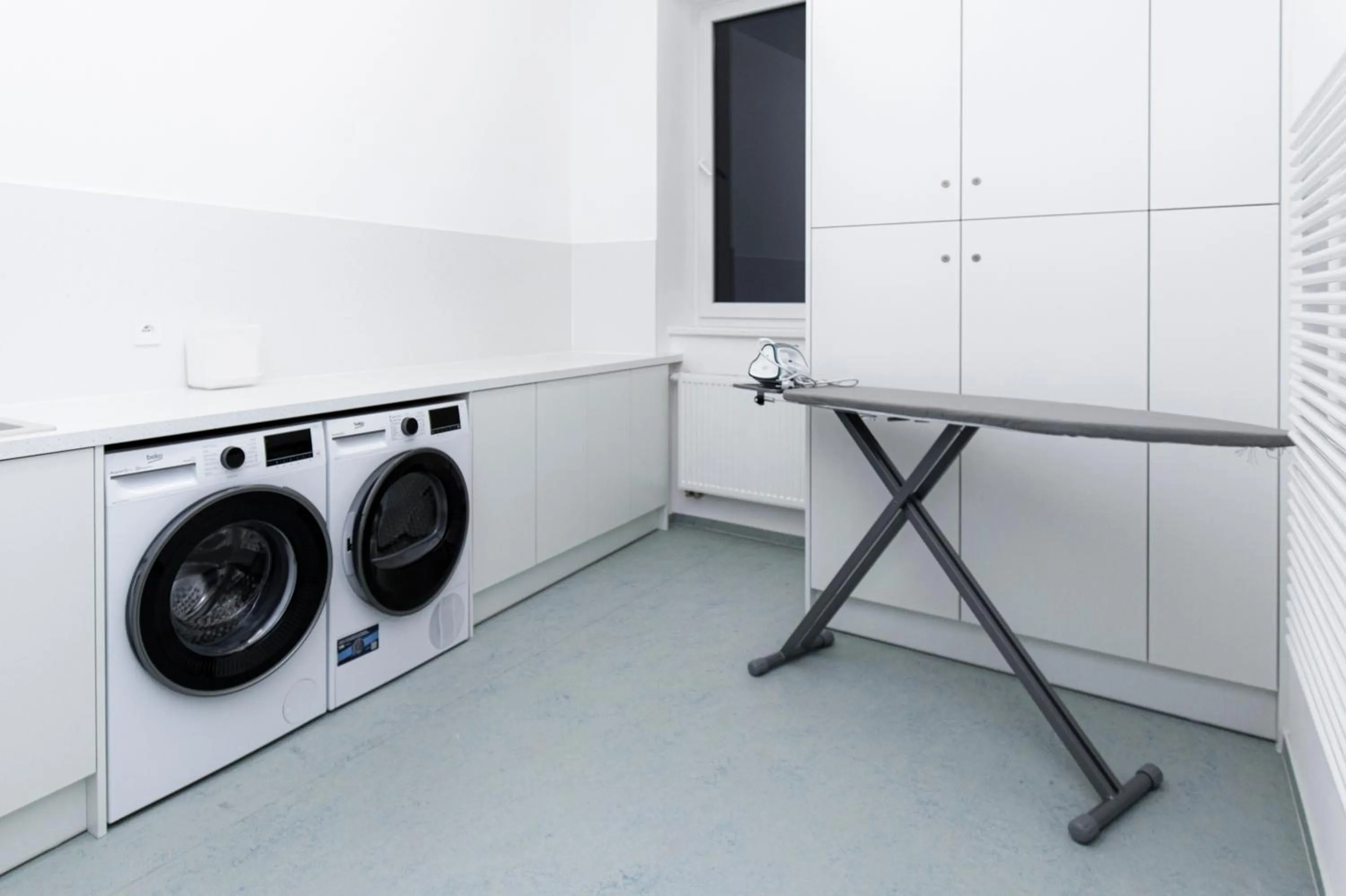 laundry in Family Apartments by ASTORIA Hotel & Medical Spa