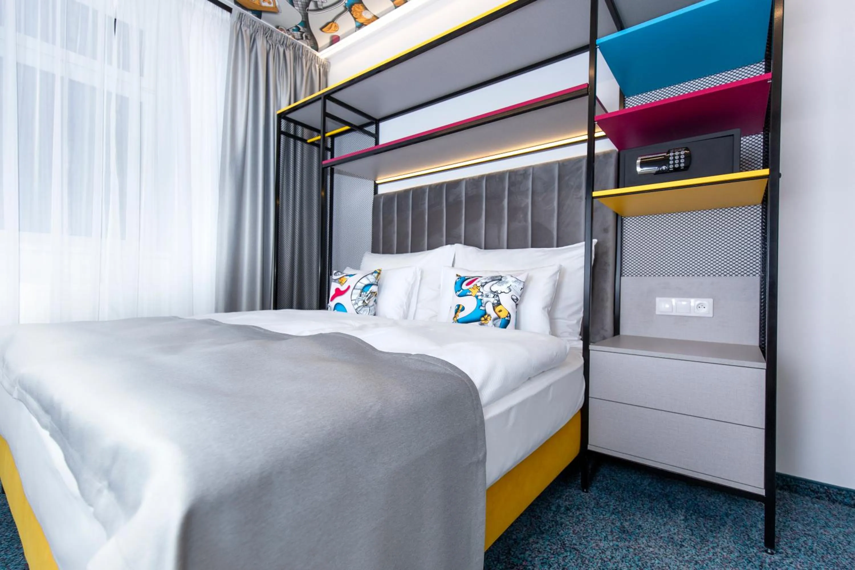 Bed in Family Apartments by ASTORIA Hotel & Medical Spa