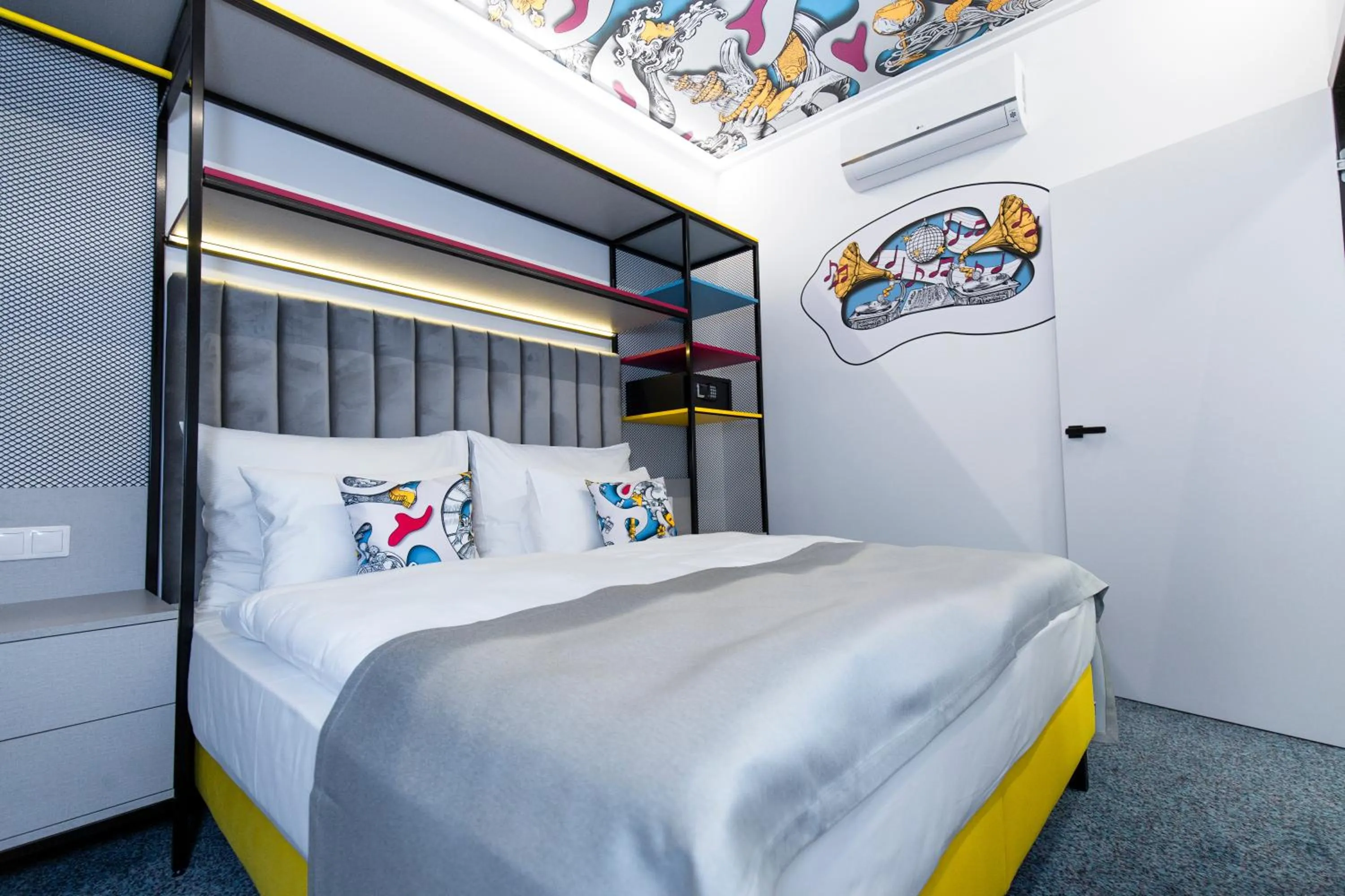 Bed in Family Apartments by ASTORIA Hotel & Medical Spa