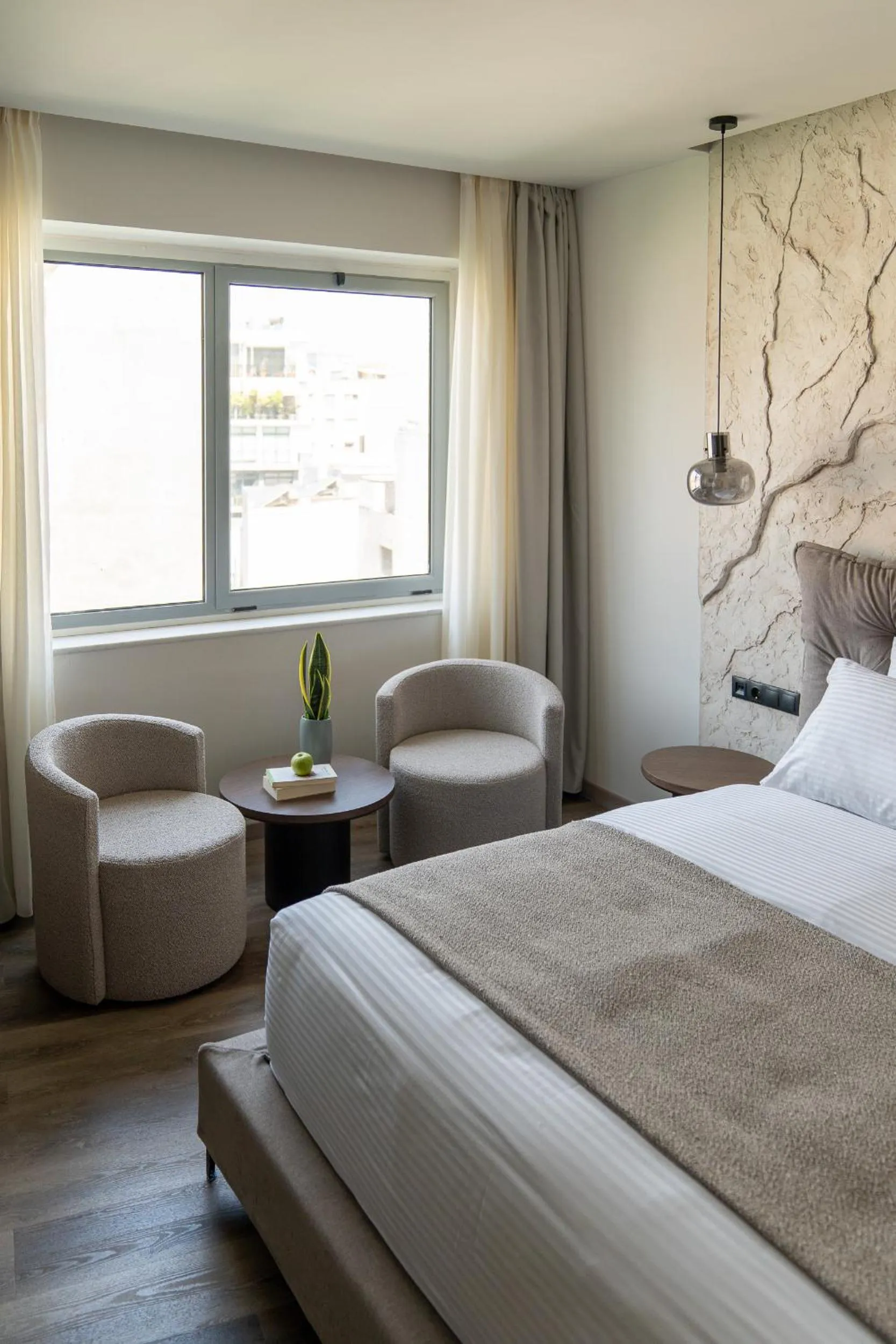 Seating area, Bed in Athens Design Suites