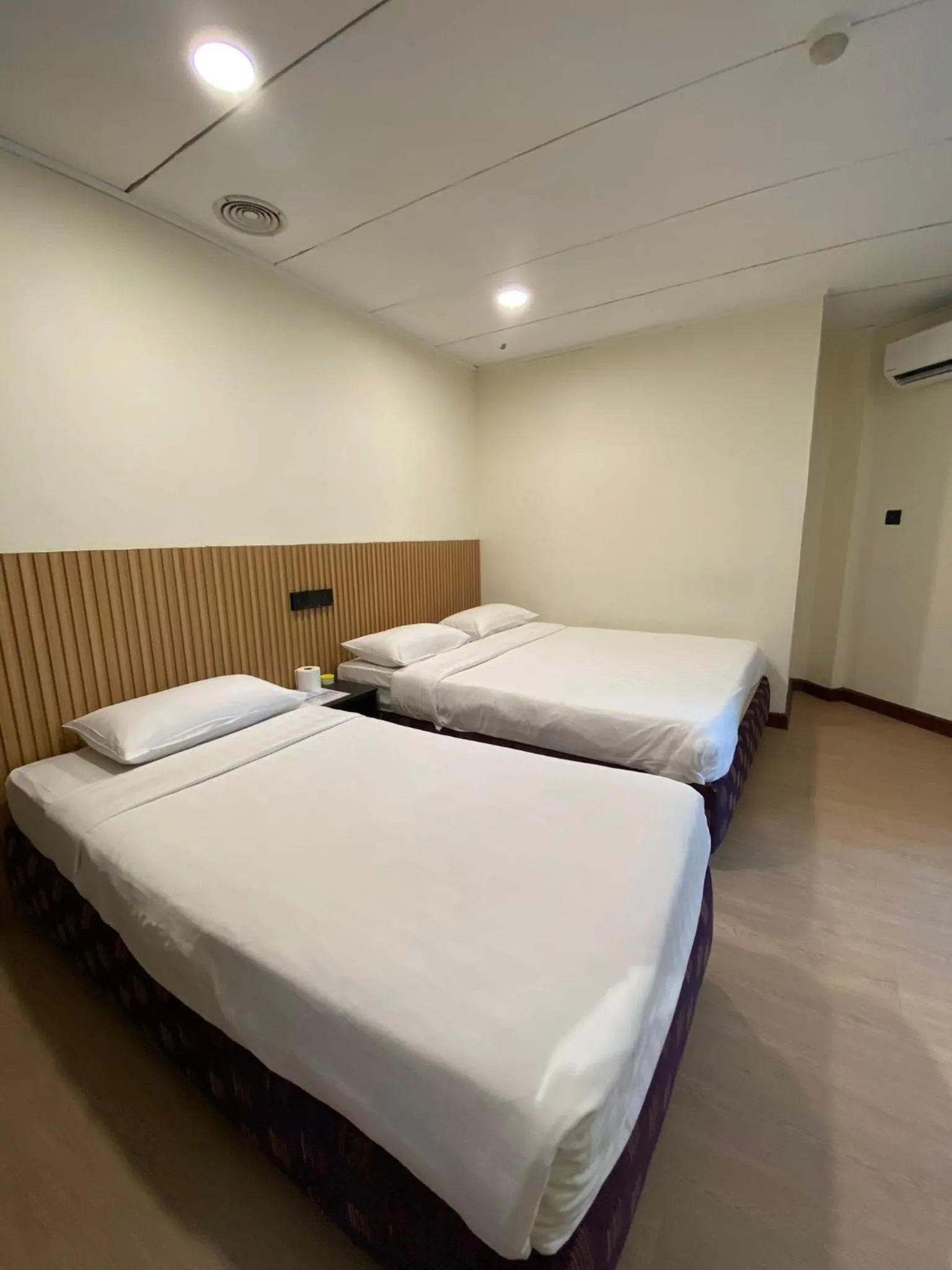 Bed in CU Boutique Hotel