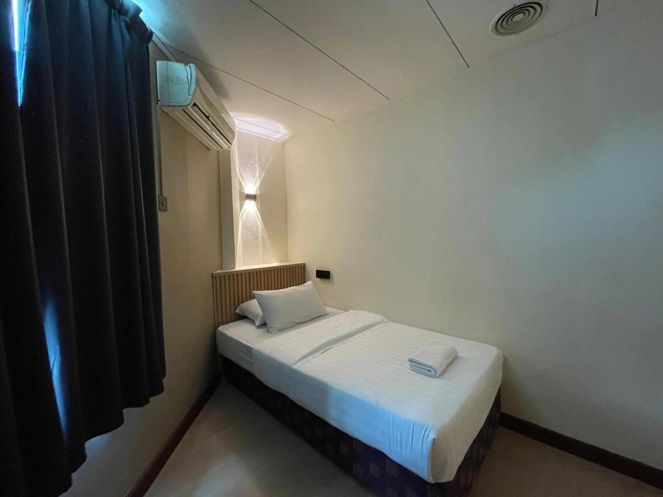 Bed in CU Boutique Hotel