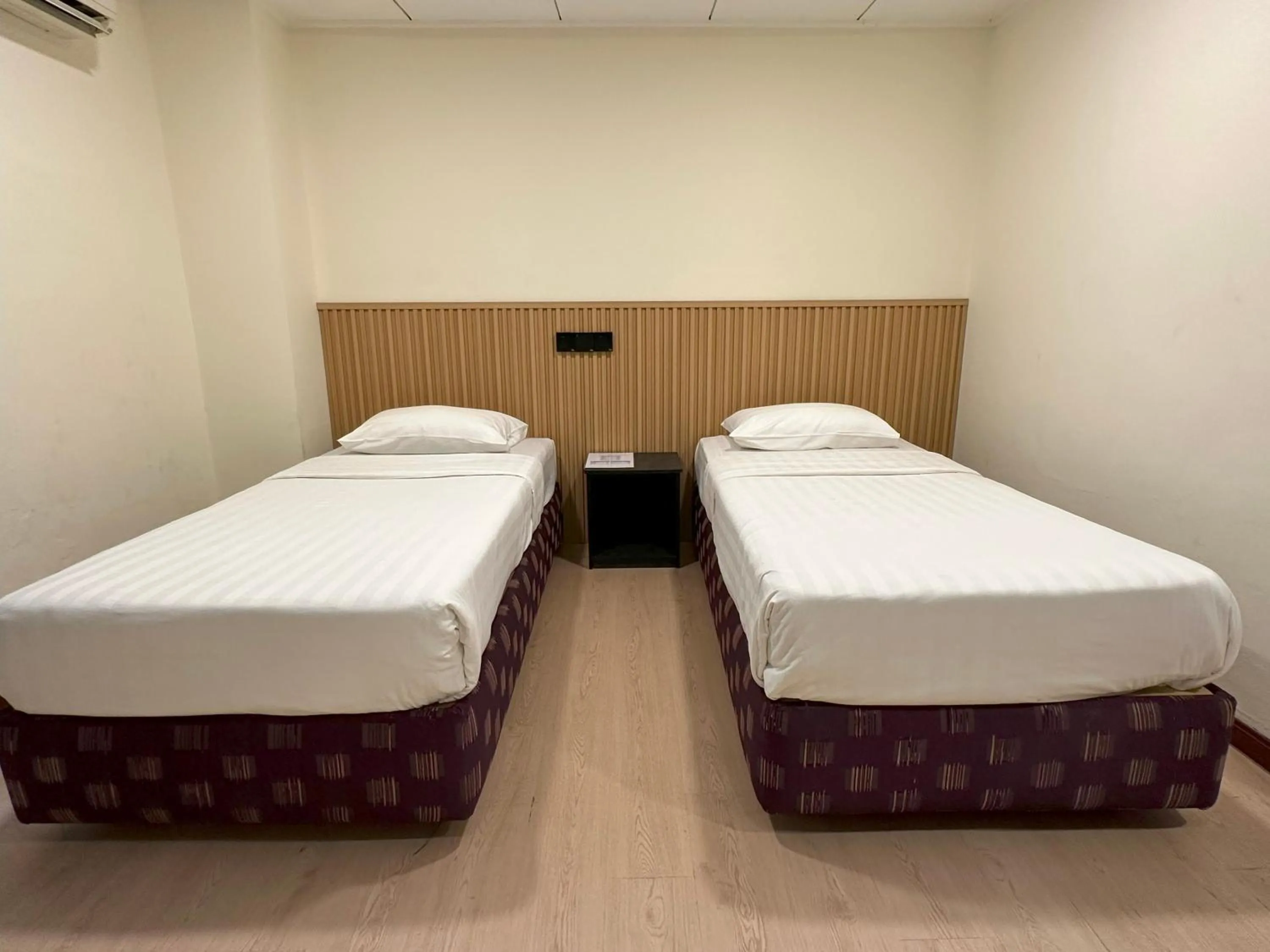 Bed in CU Boutique Hotel