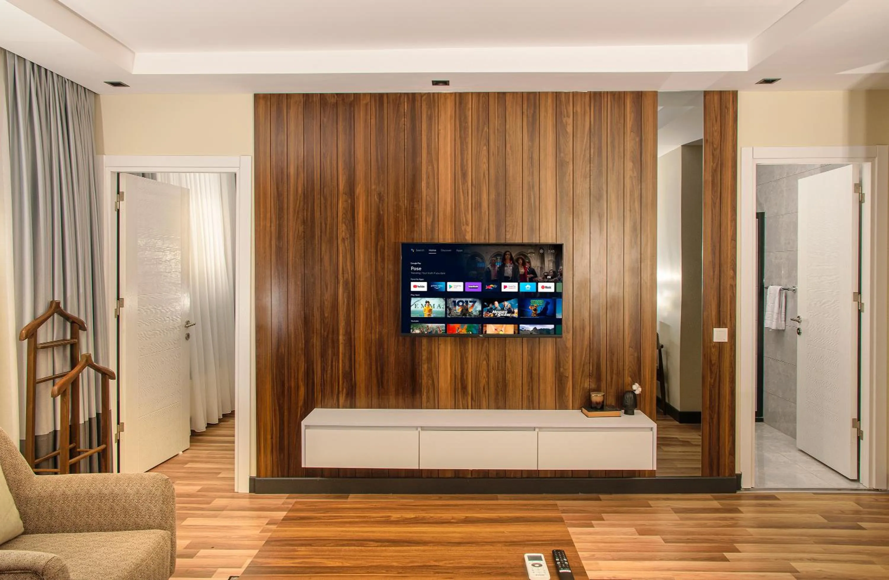 Communal lounge/ TV room in La Mia Suites