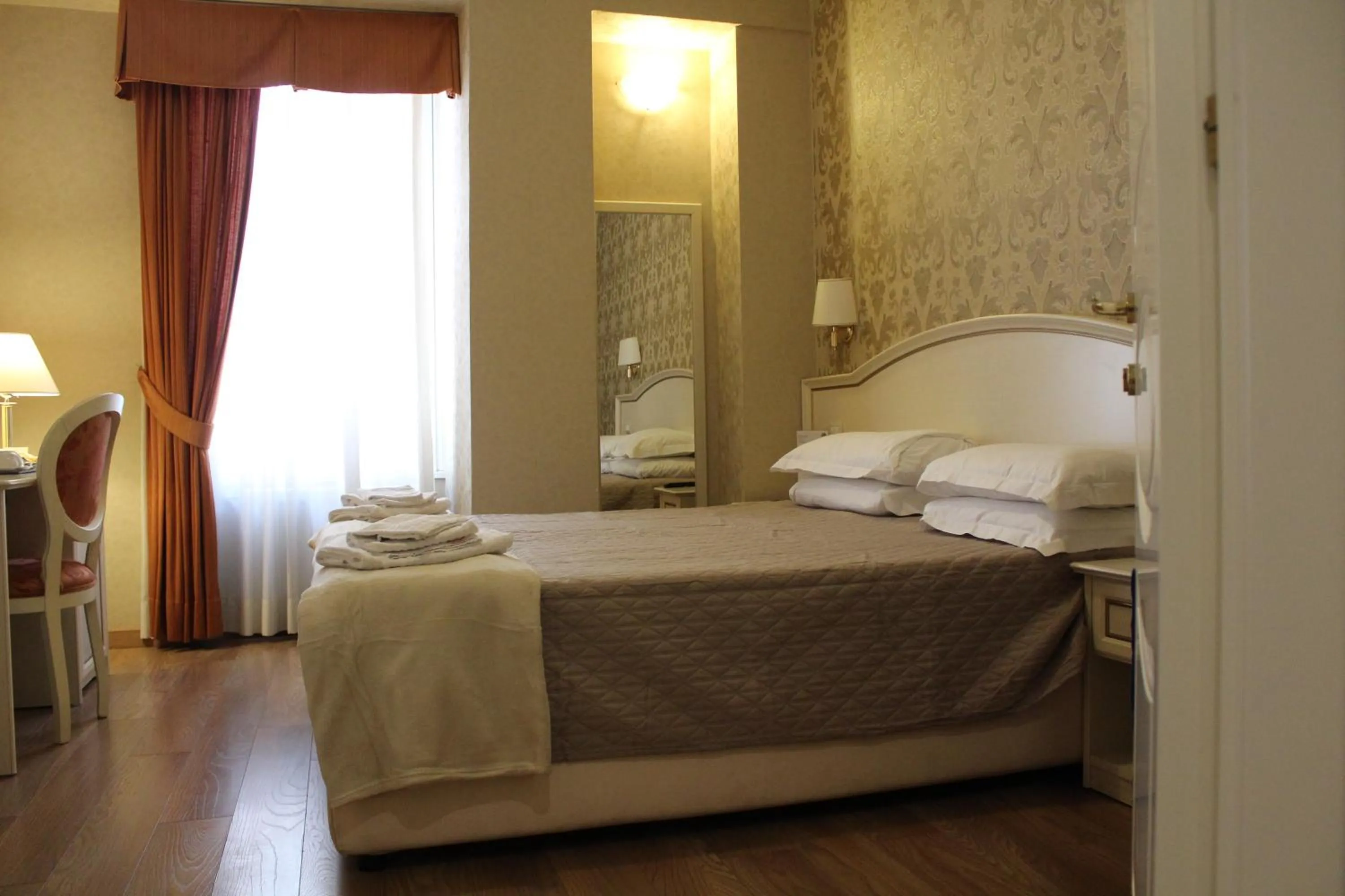 Photo of the whole room, Bed in Relais Bocca di Leone