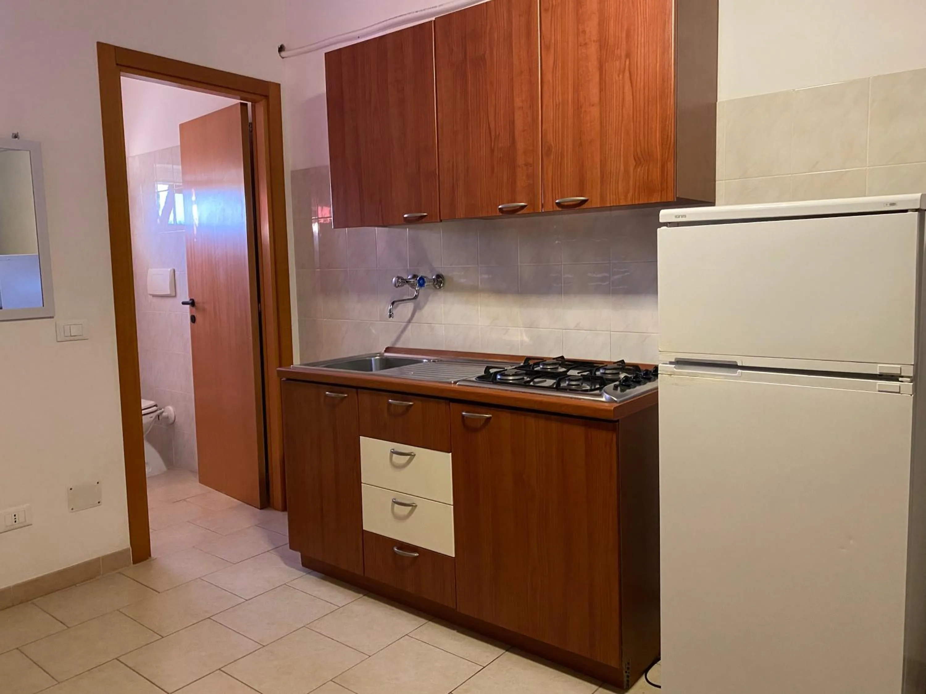 Kitchen or kitchenette in Appartamenti Vacanze Minervino