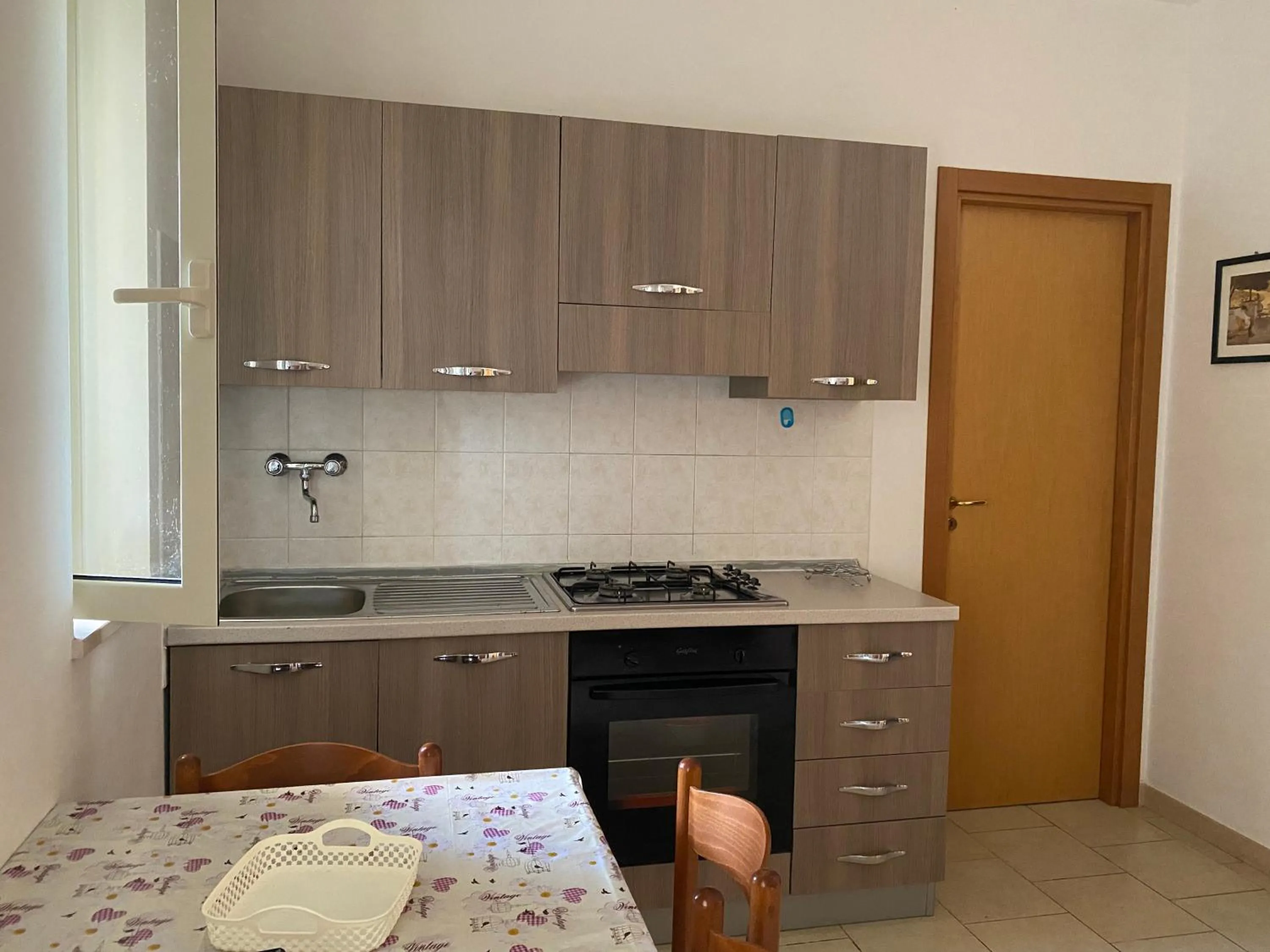 Kitchen or kitchenette in Appartamenti Vacanze Minervino