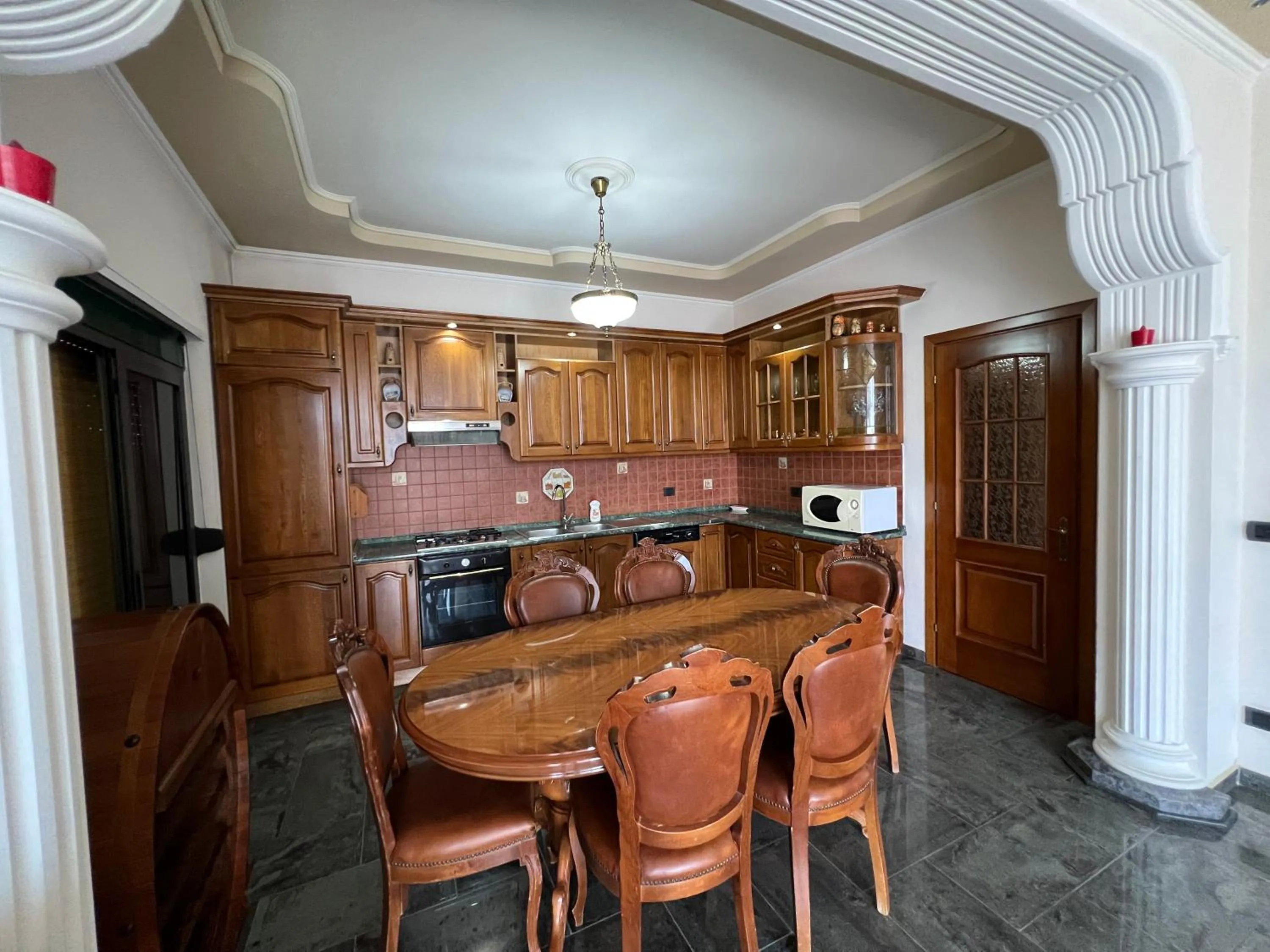 Kitchen or kitchenette in Green Garden Villa