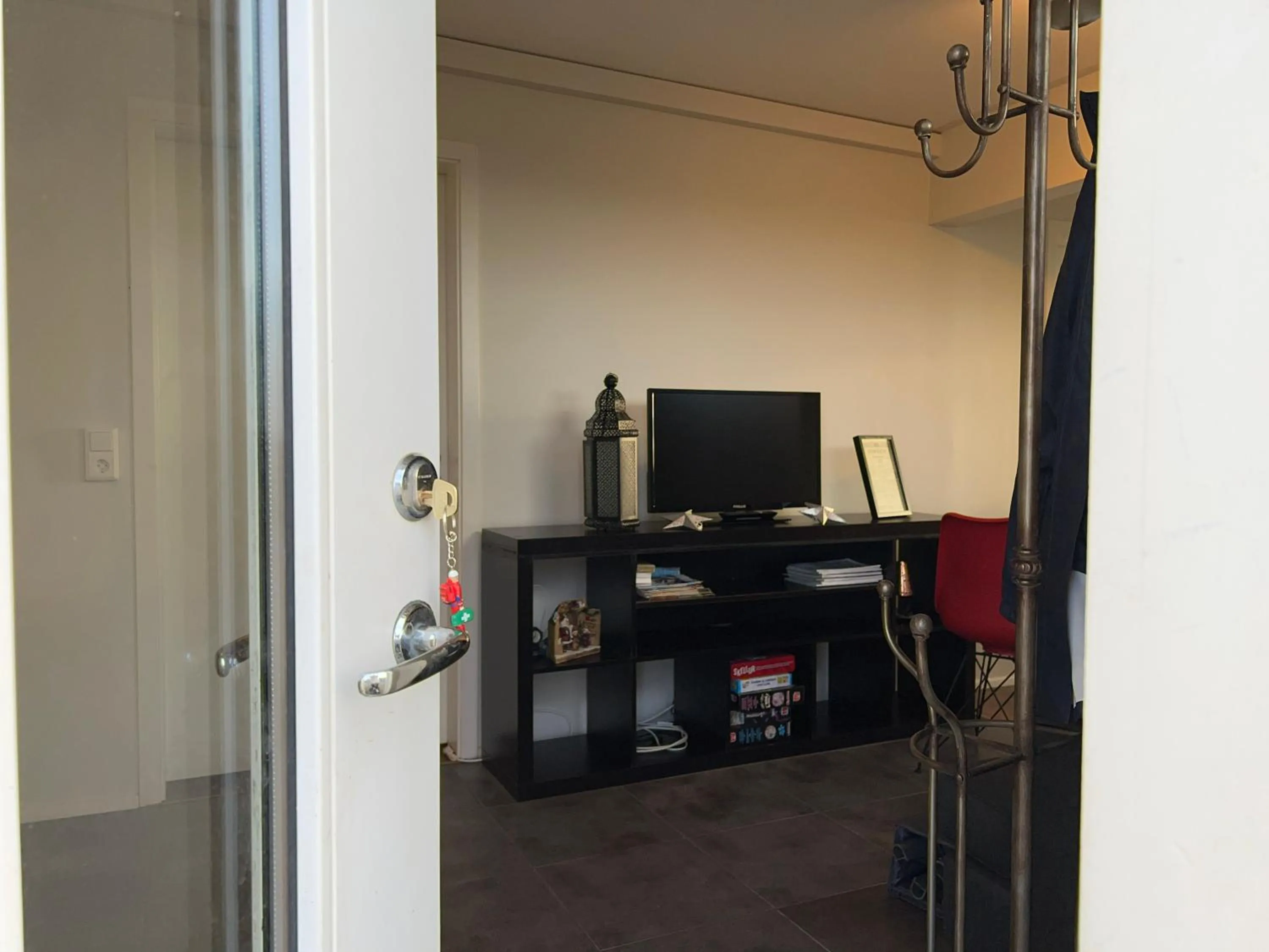 Communal lounge/ TV room in Bakland ad Lágafelli Apartment