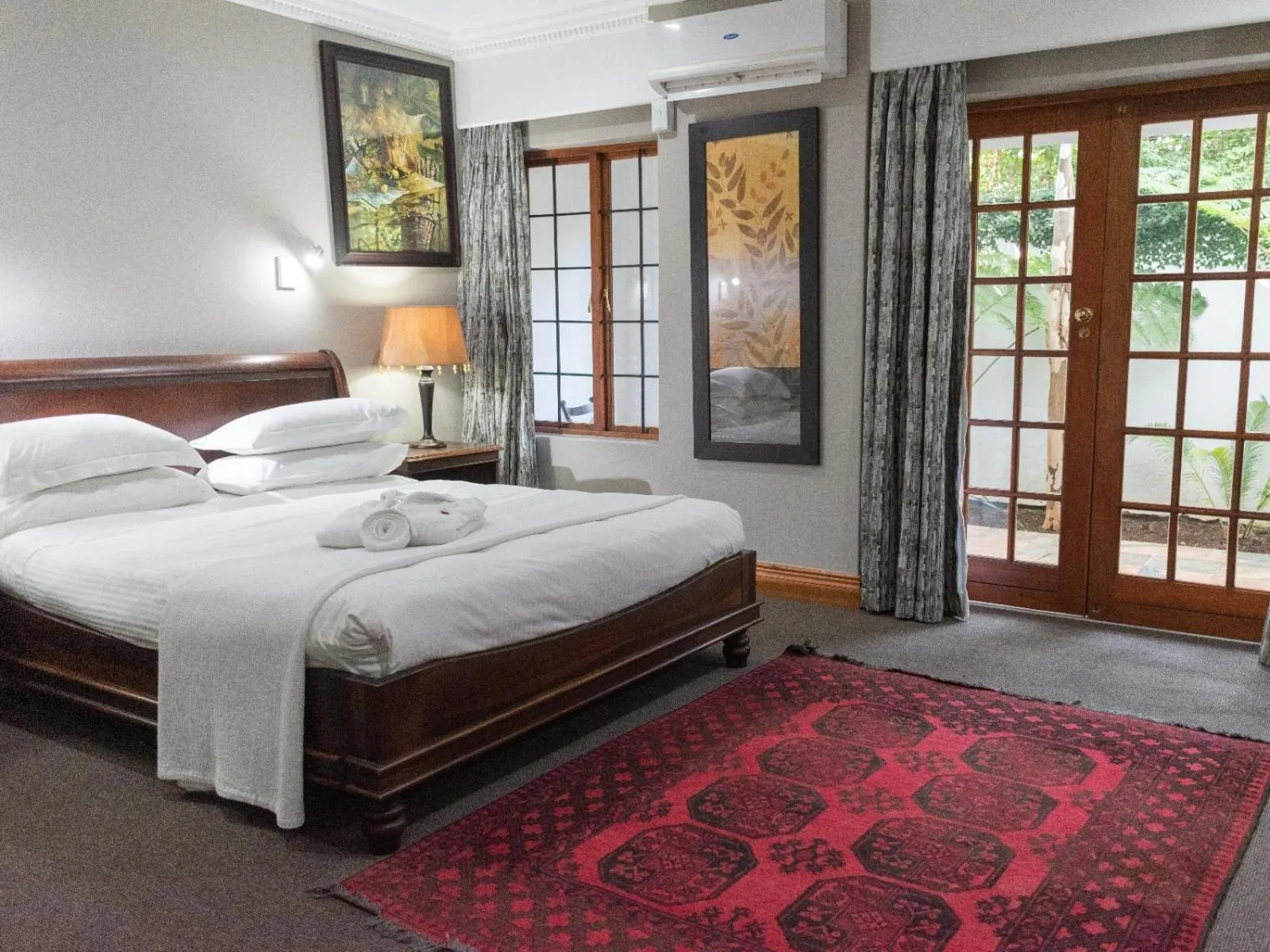 Bed in Aanmani Rose Guesthouse