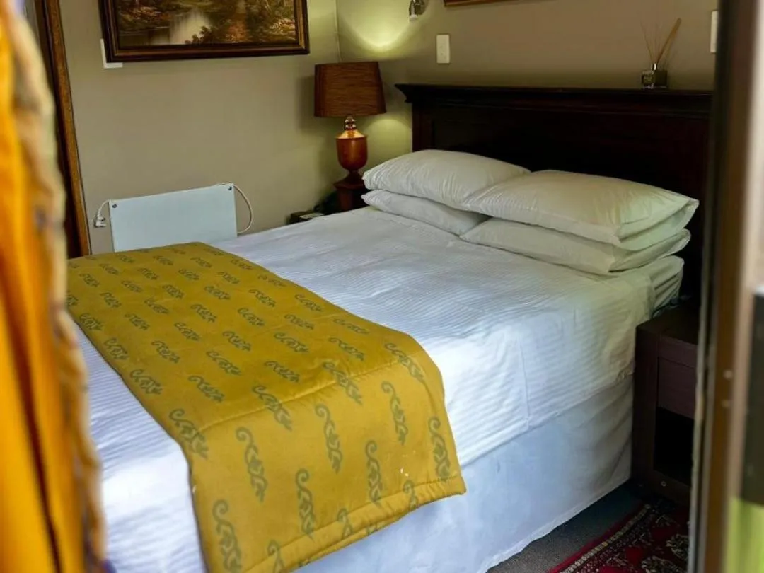 Bed in Aanmani Rose Guesthouse