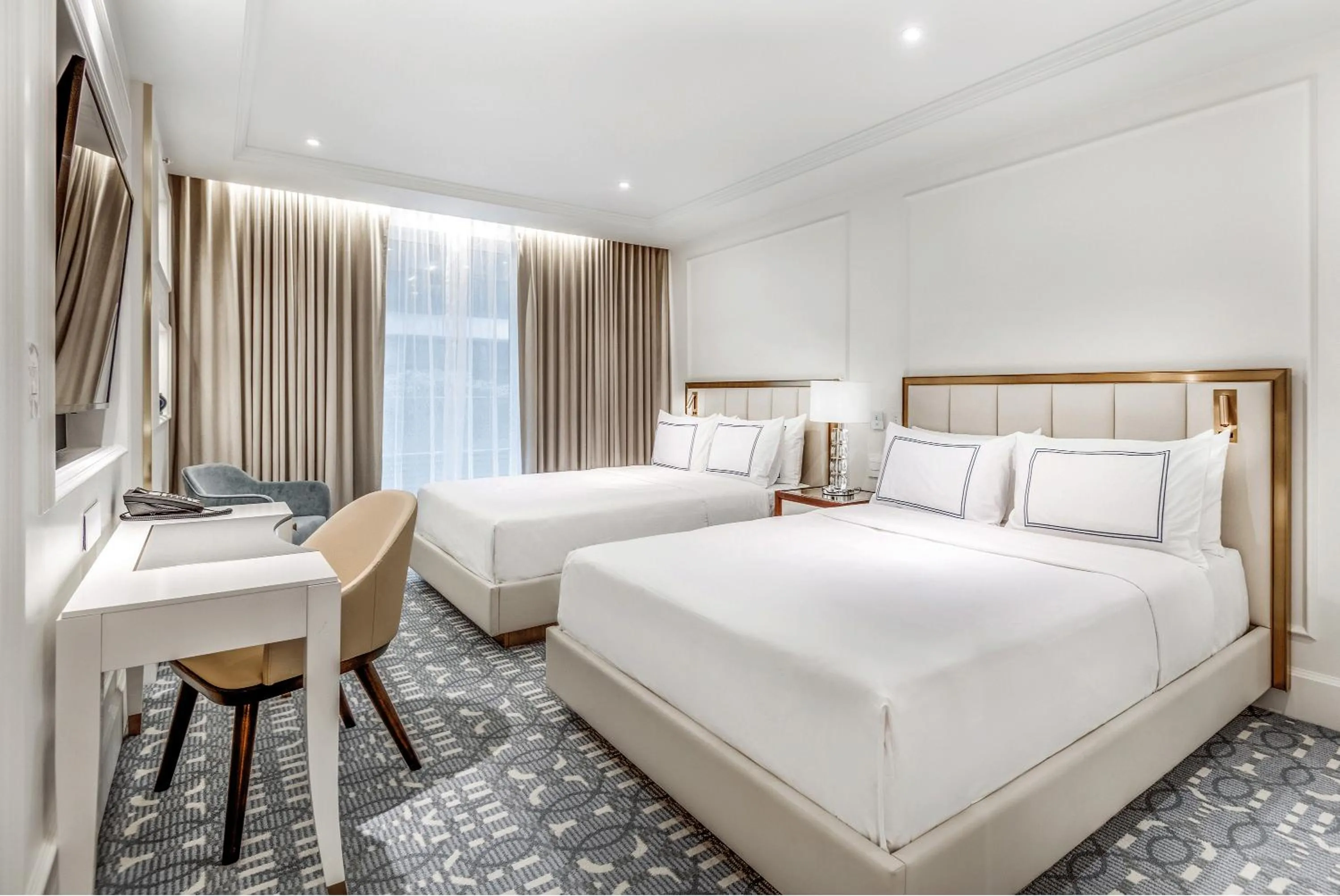 Bed in AZUR Legacy Collection Hotel