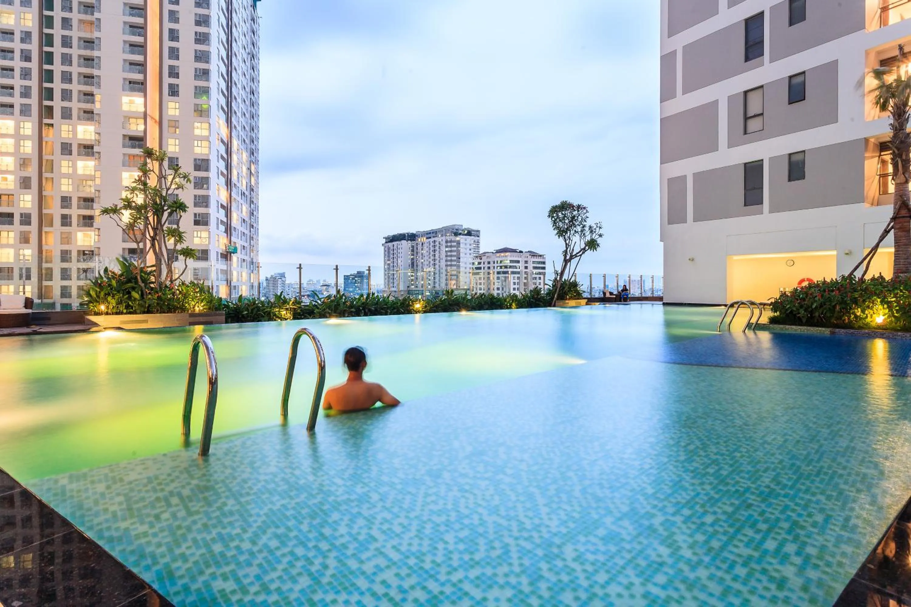 Swimming pool in YO's Homes Rivergate Apartment Infinity Pool Near District 1