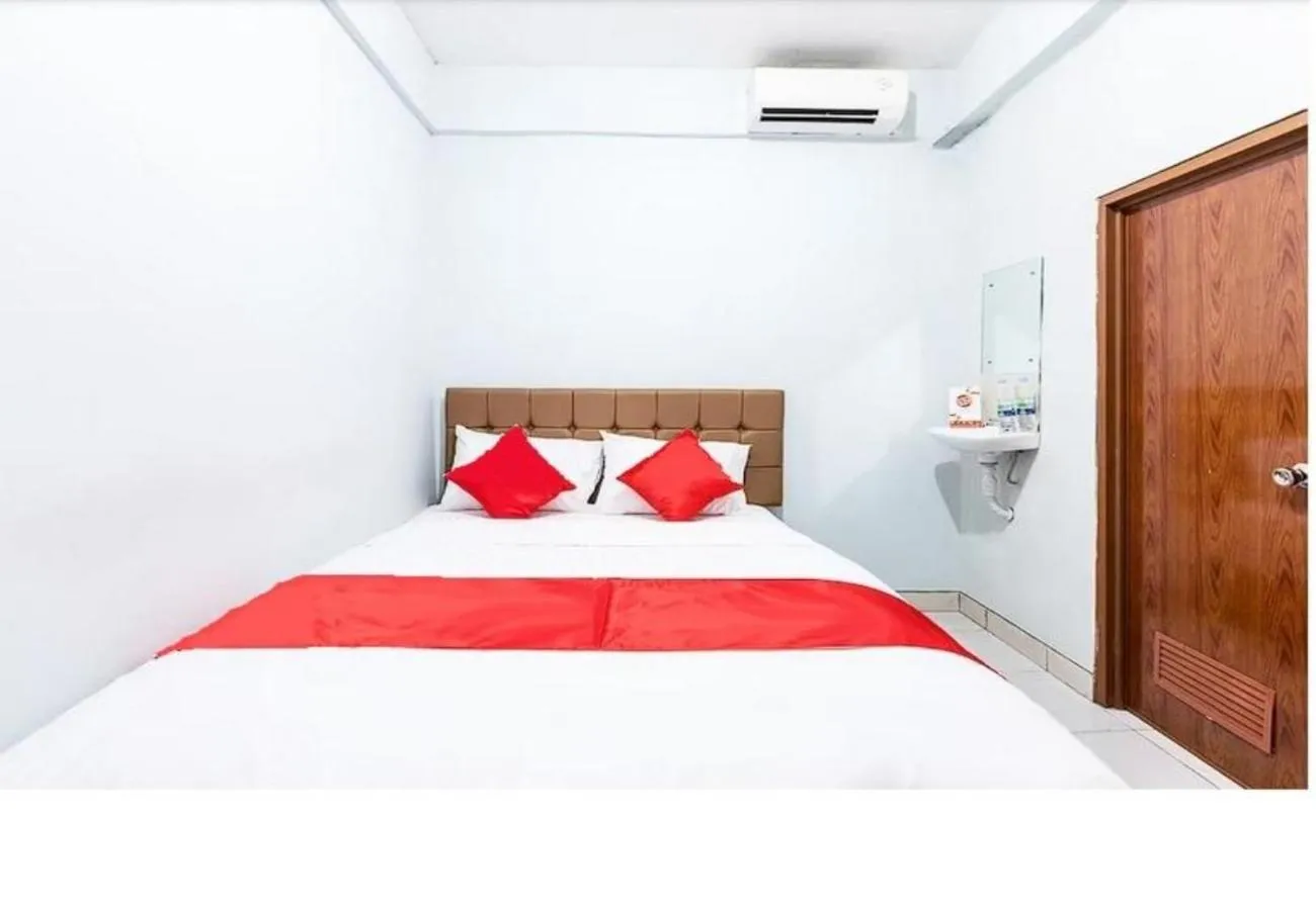 Bed in Hotel Cemara Gading