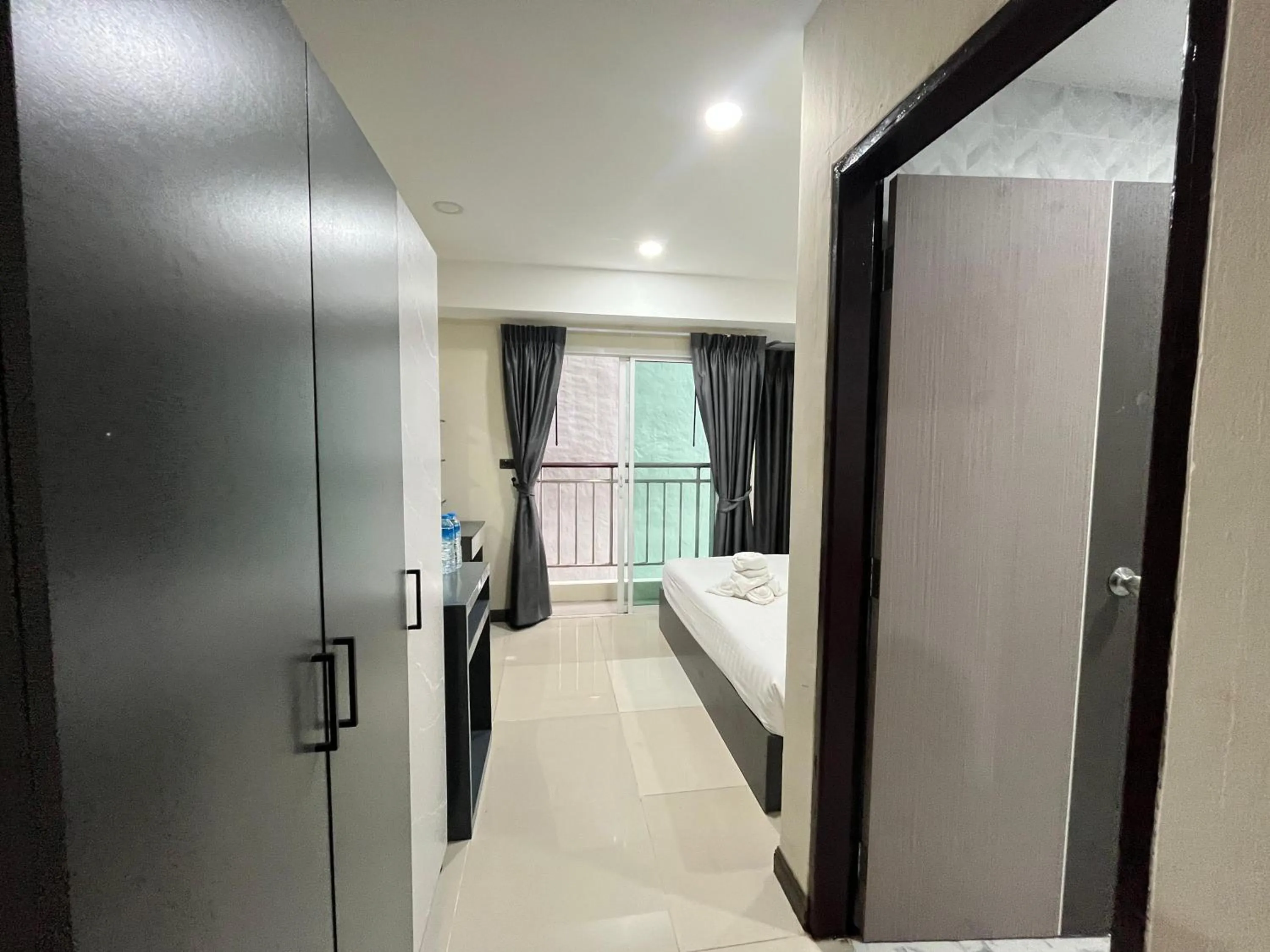 wardrobe, Bed in Cocoon APK Resort & Spa