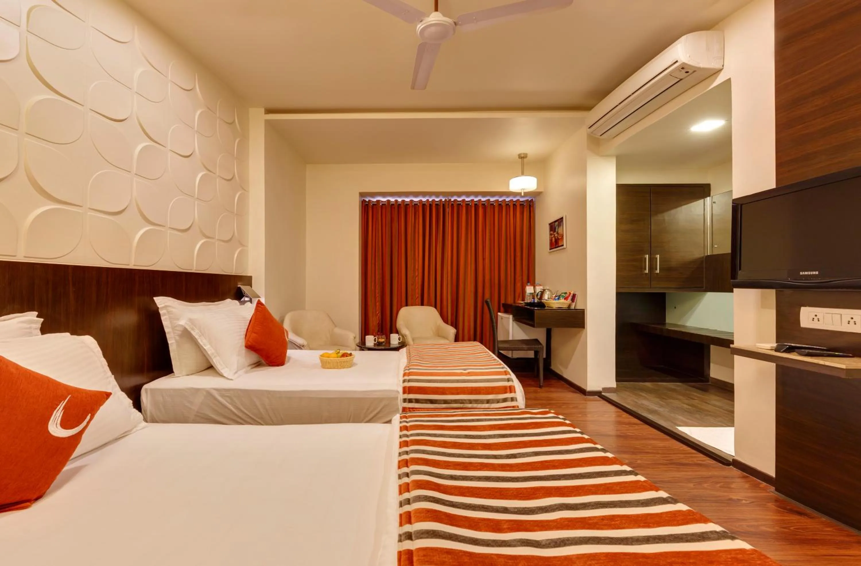 Bedroom, Bed in Regenta Place Raysons Kolhapur