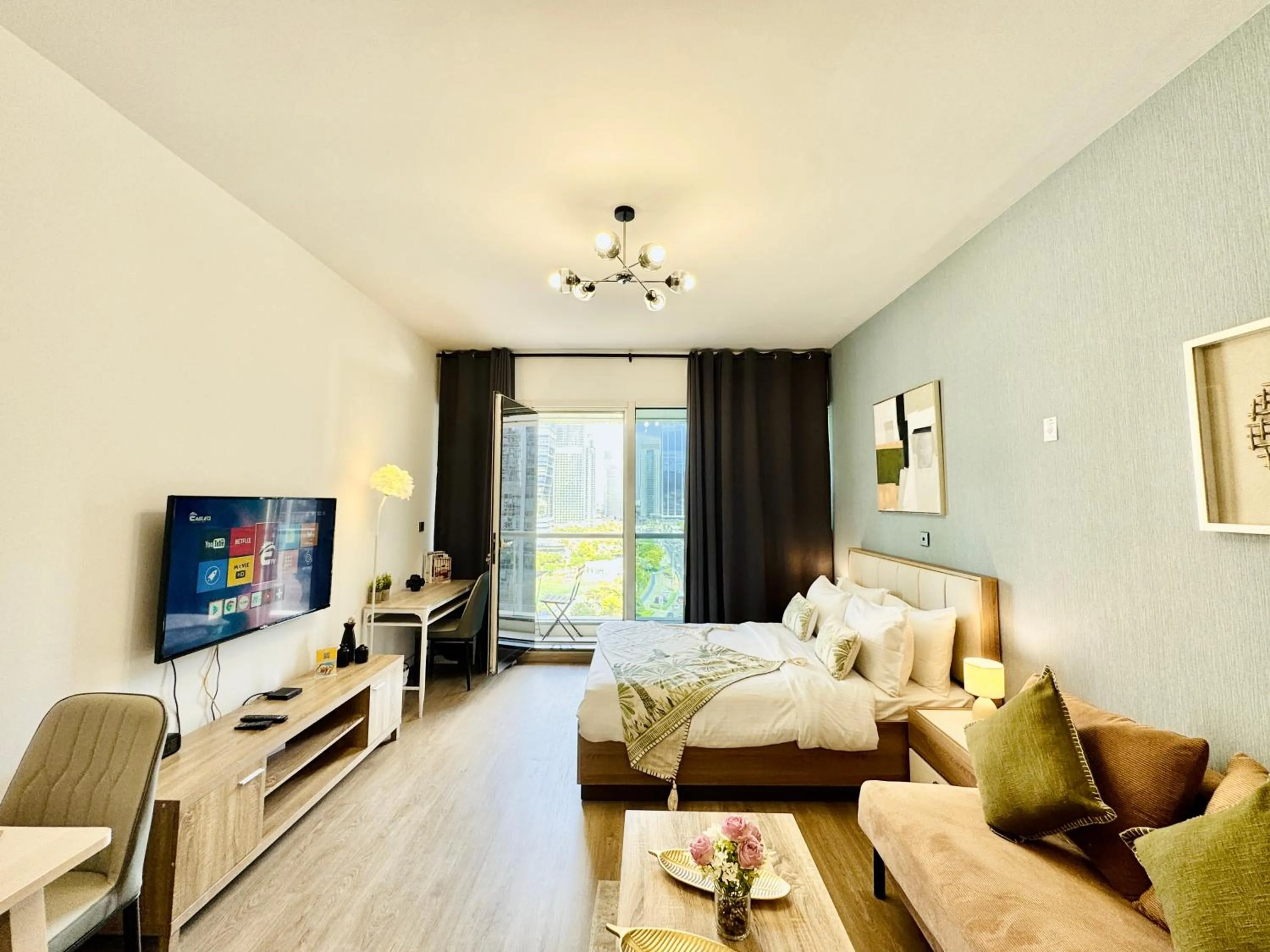 TV and multimedia in Cosmos Living Dubai Arch Tower Pool, Gym & Balcony