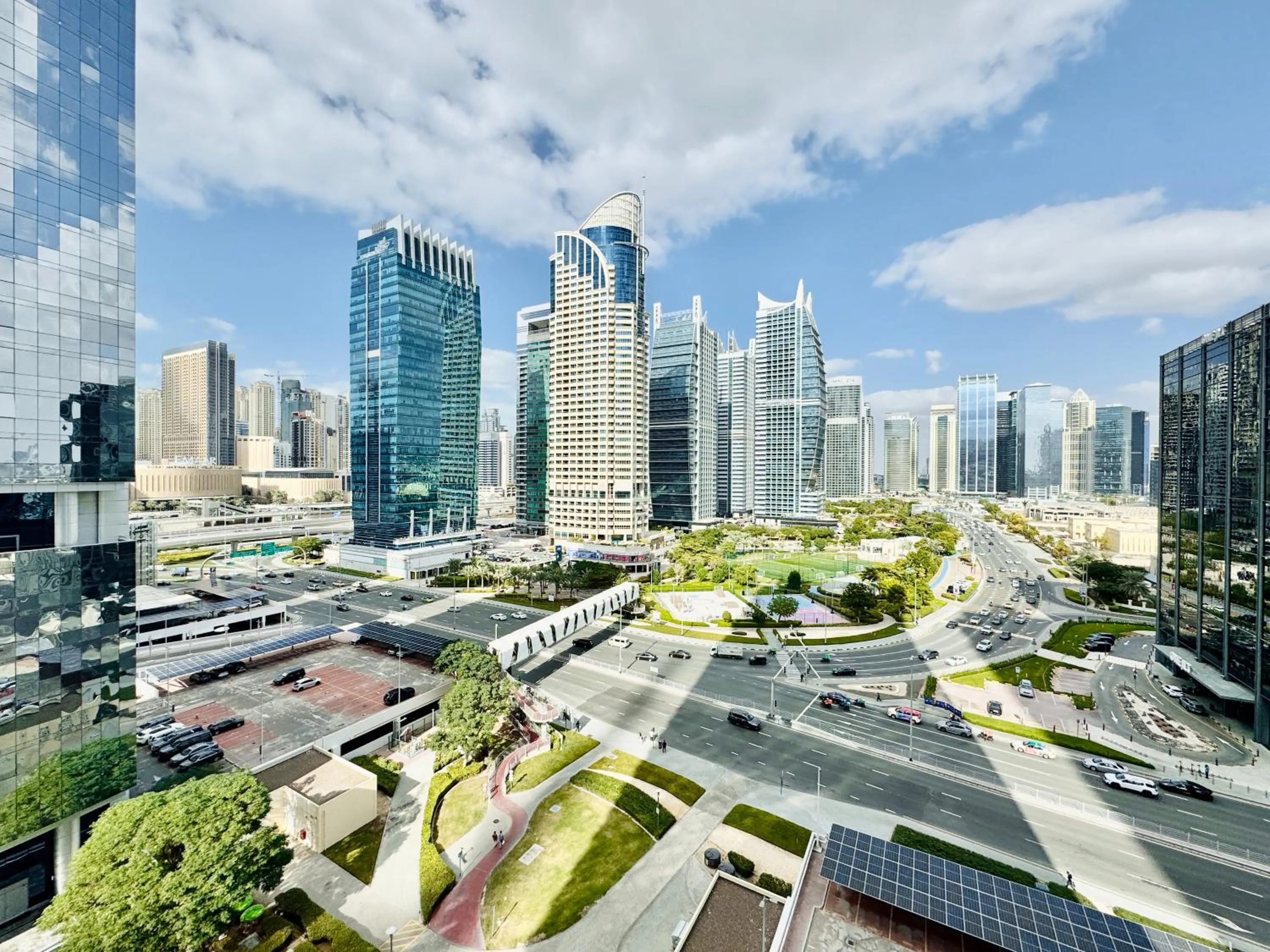 Day in Cosmos Living Dubai Arch Tower Pool, Gym & Balcony