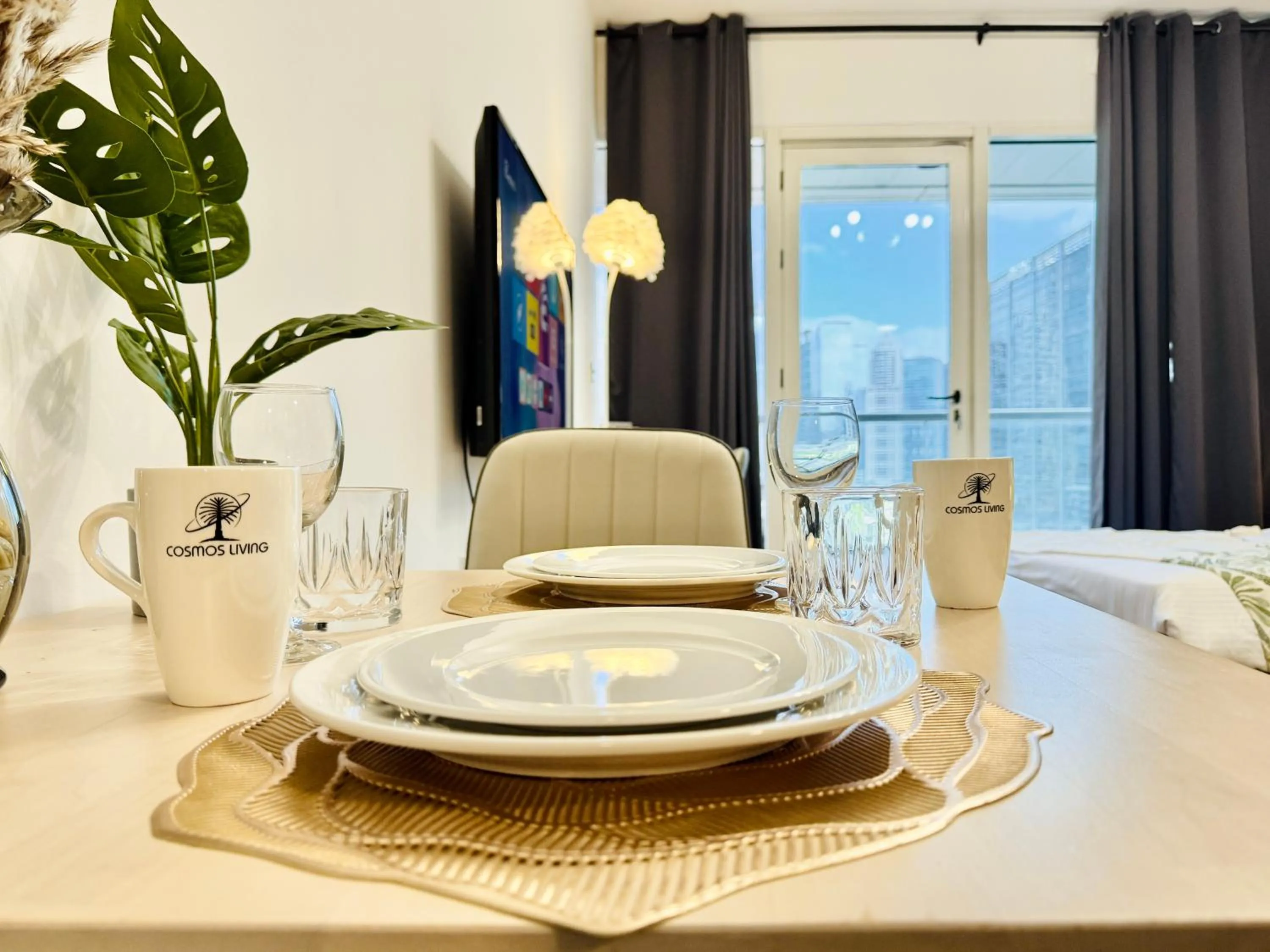 Dining area in Cosmos Living Dubai Arch Tower Pool, Gym & Balcony