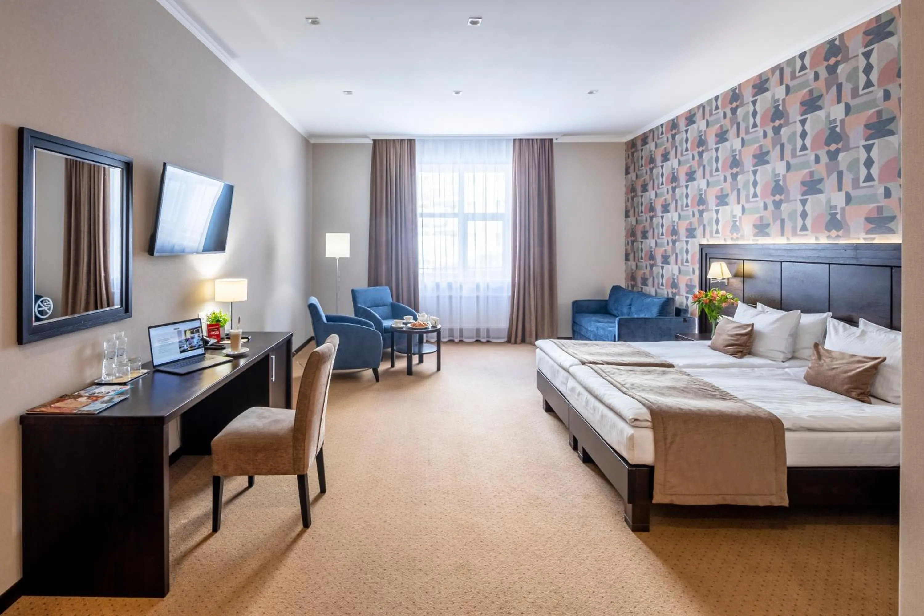 Bed in Taurus Hotel & SPA