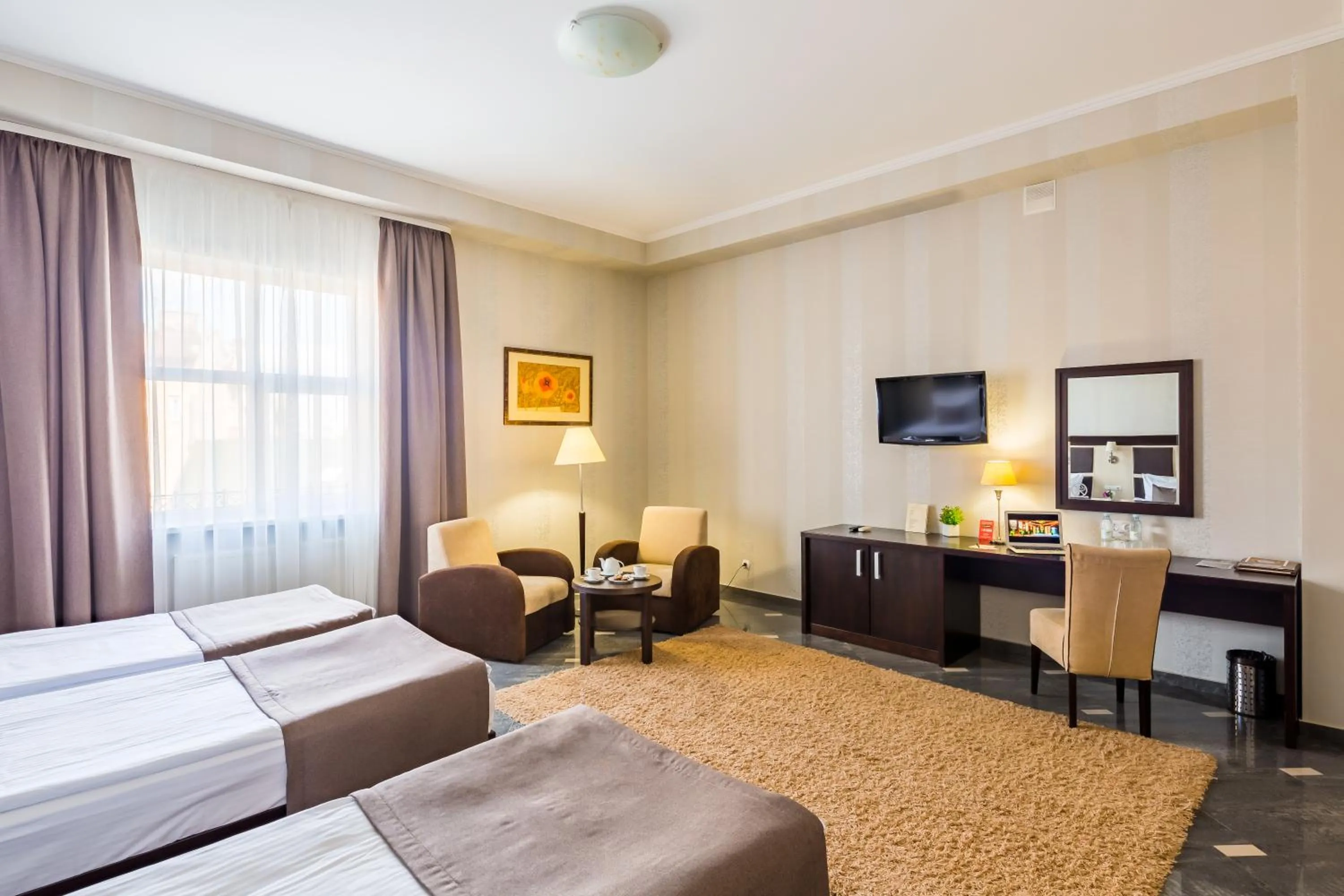 Photo of the whole room, Bed in Taurus Hotel & SPA