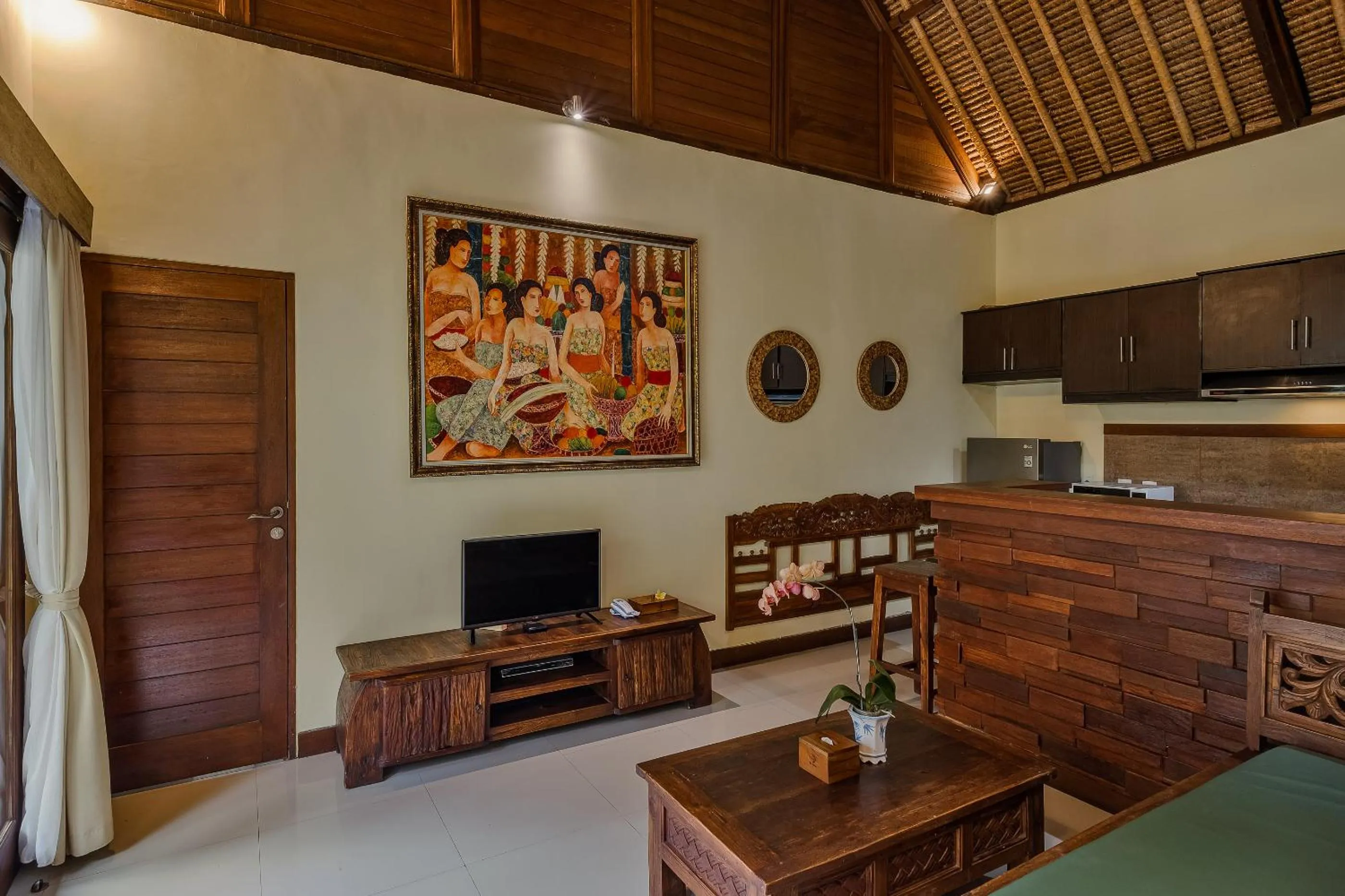 Communal lounge/ TV room in Teja Lokha Ubud Villa