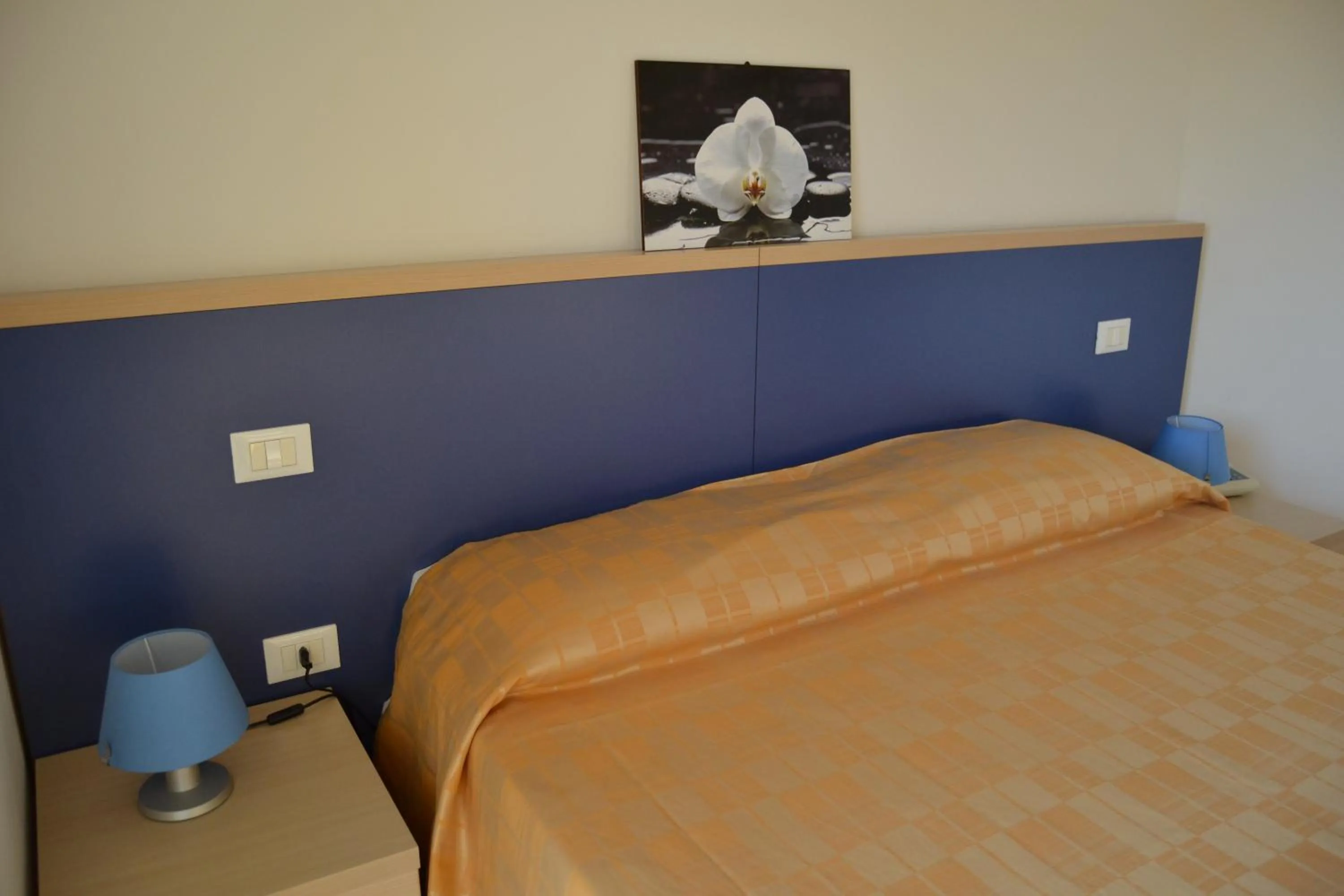 Bed in Hotel Quattro Palme