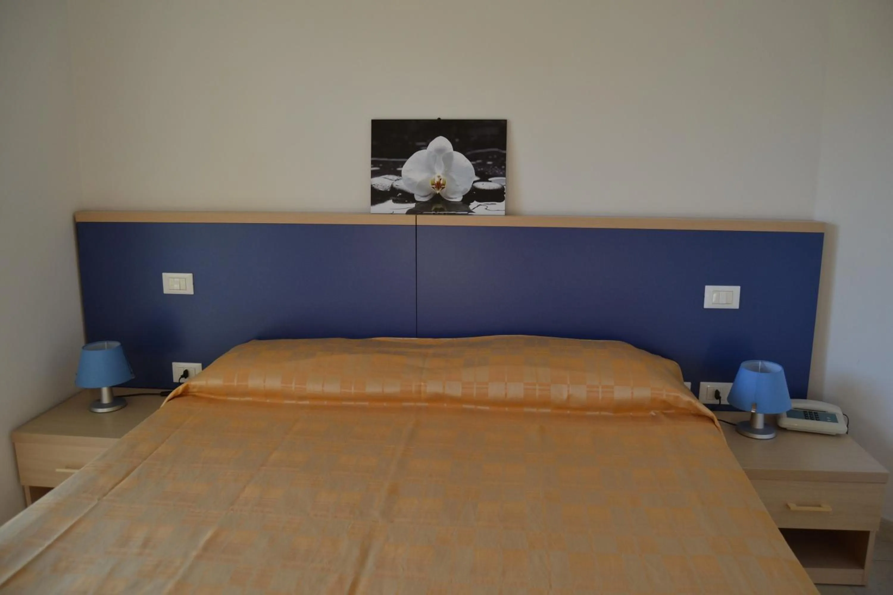 Bed in Hotel Quattro Palme