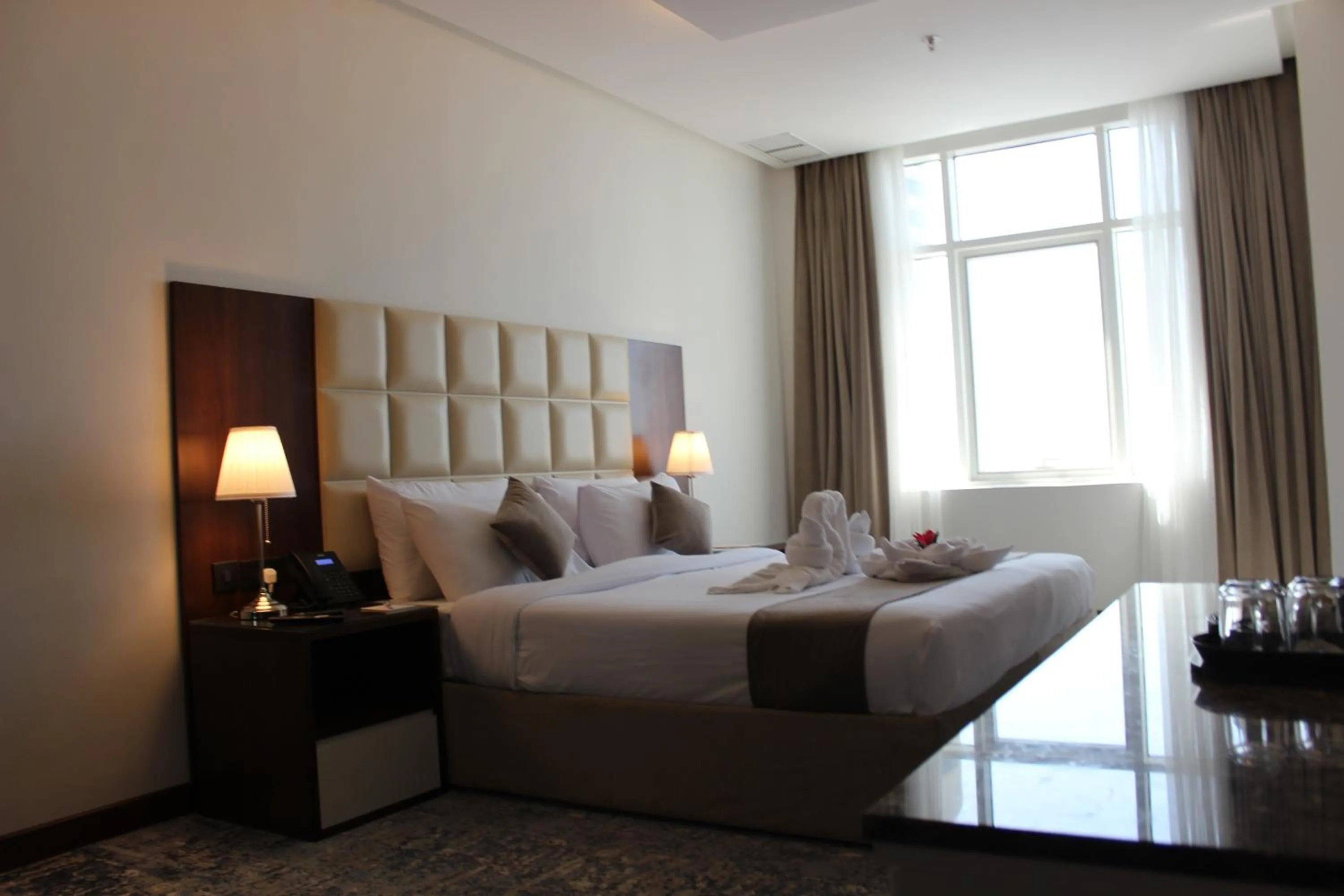 Bed in Dolphin Continental Hotel