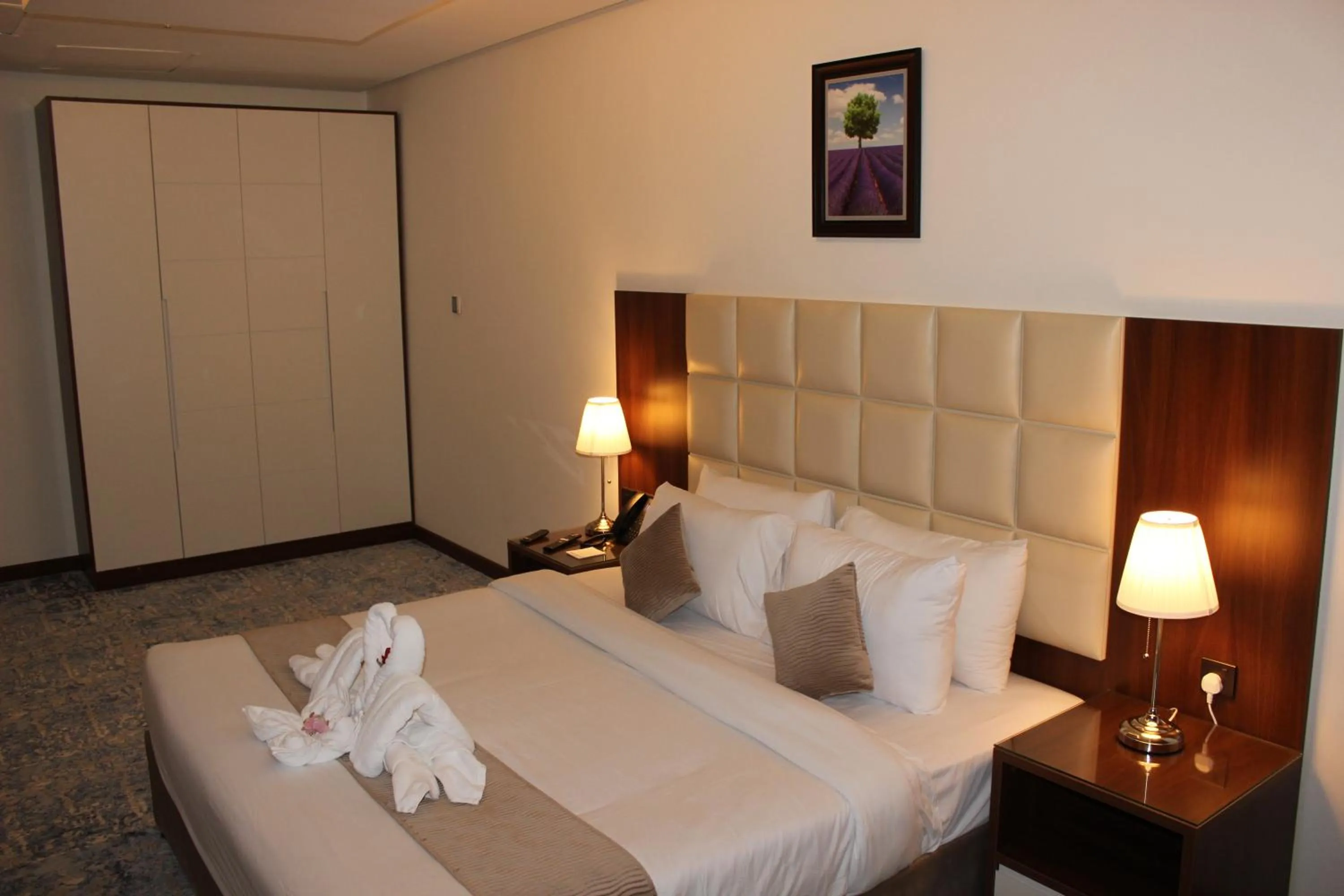 Bed in Dolphin Continental Hotel