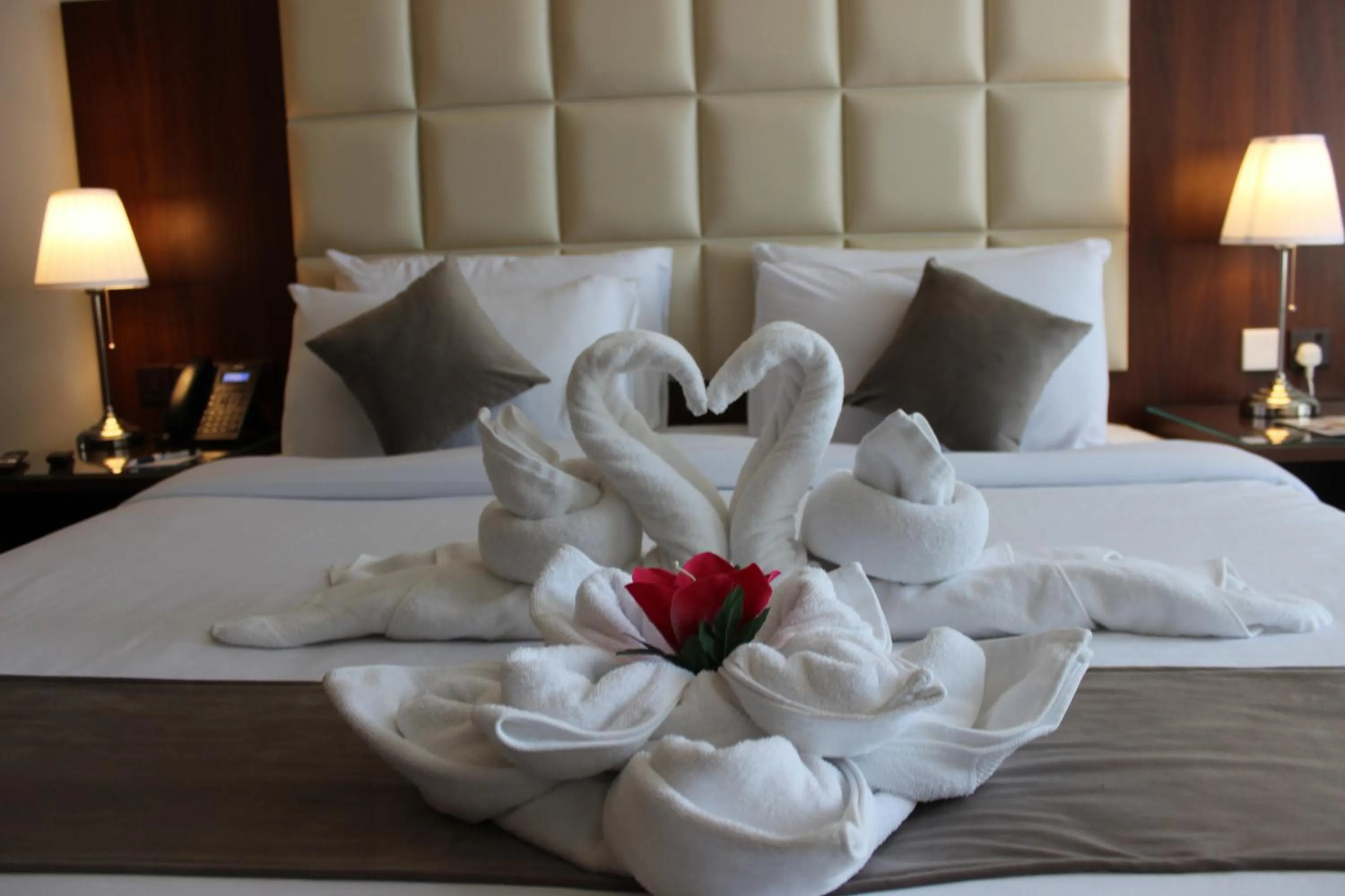 Bed in Dolphin Continental Hotel