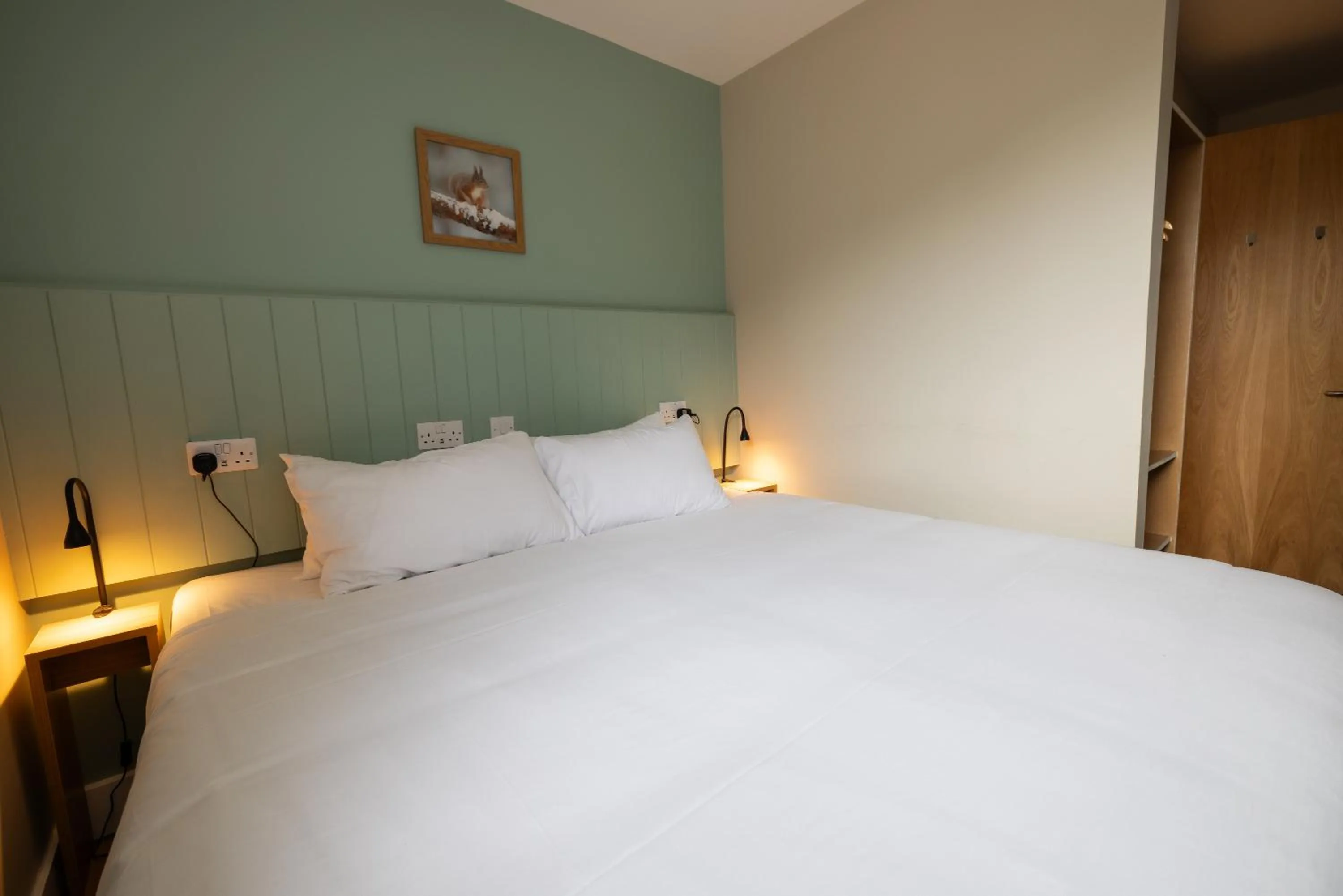 Bathroom, Bed in An Spiris Accommodation at Dundreggan Rewilding Centre
