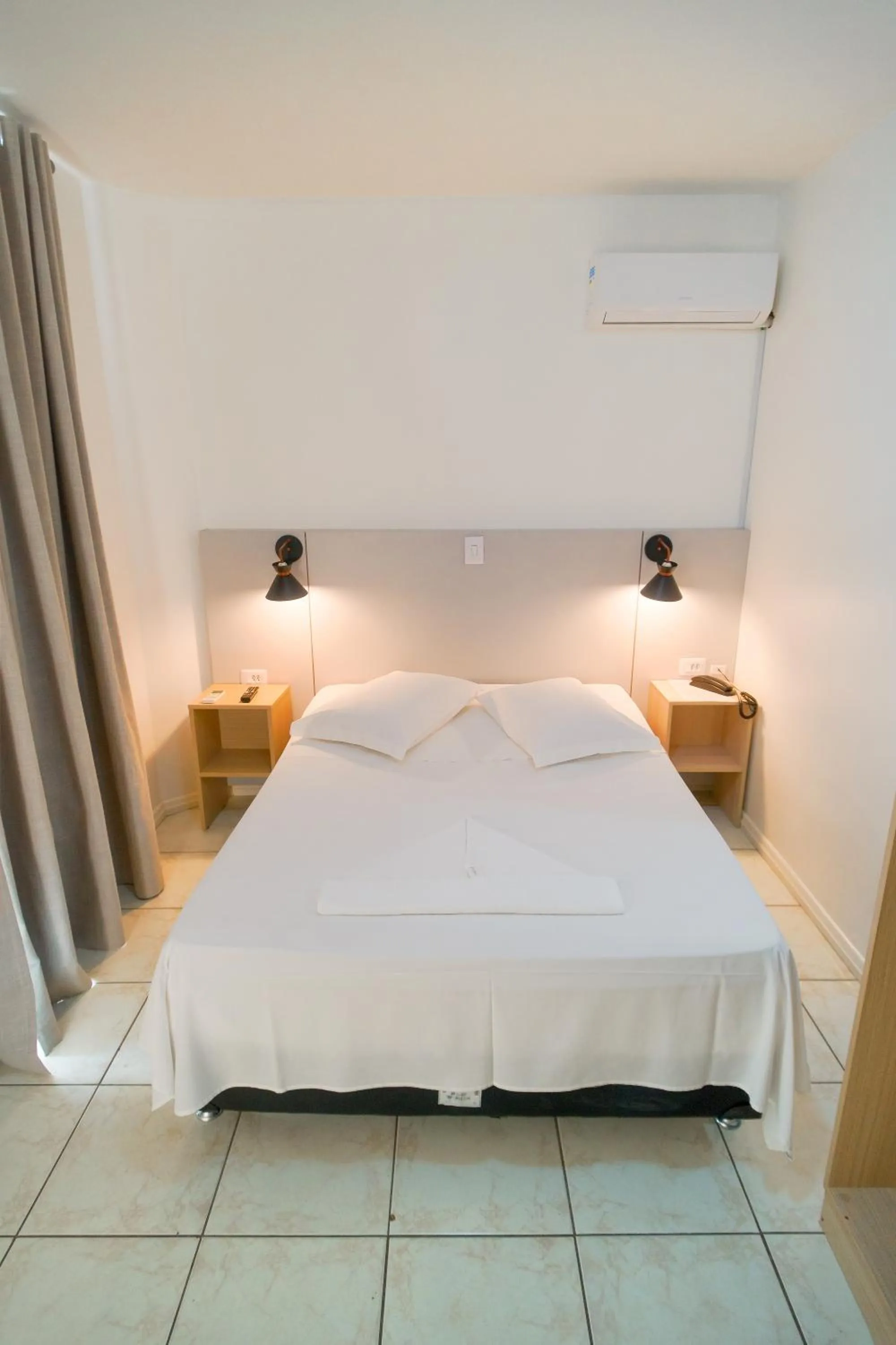 Bed in Xangri-La Praia Hotel