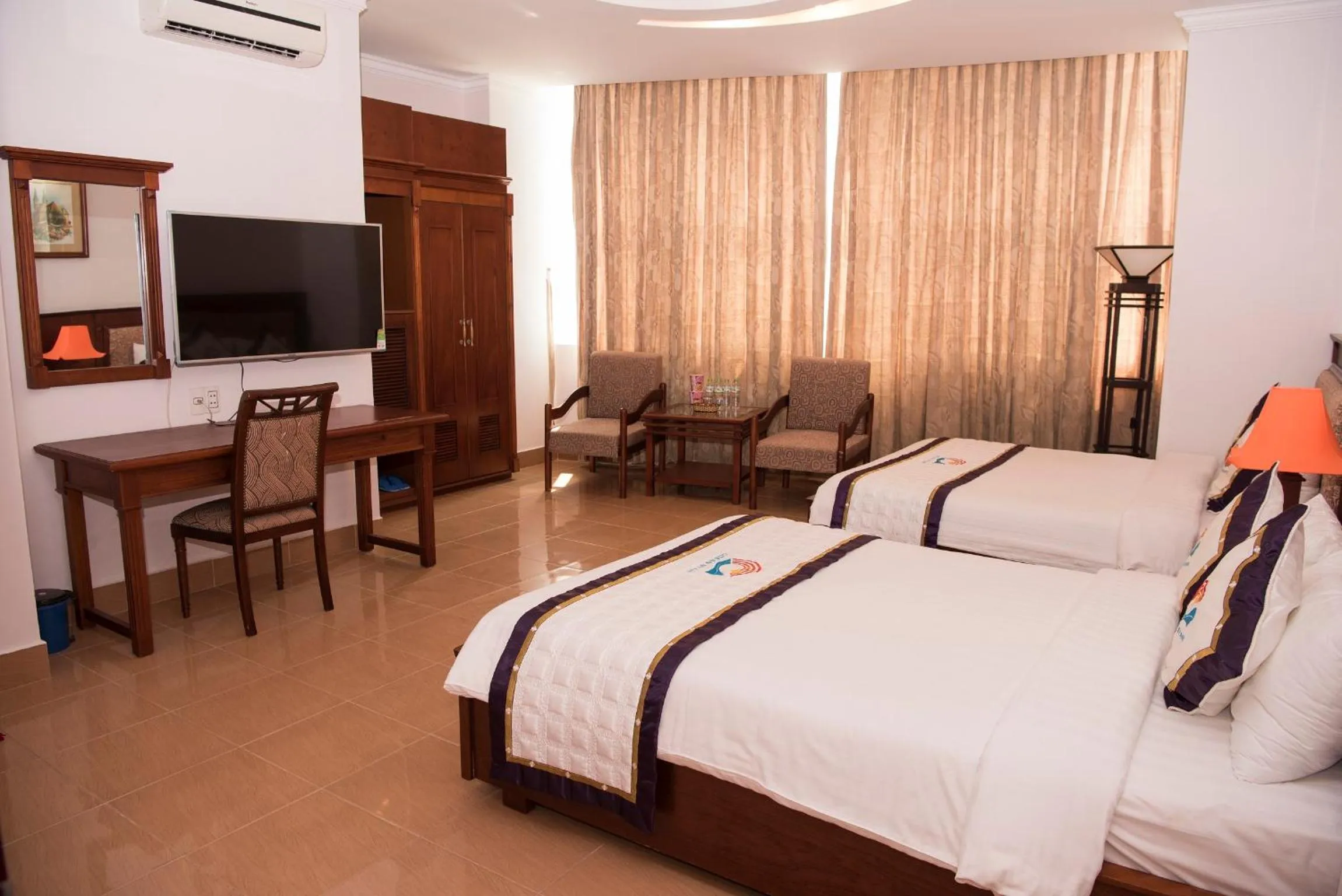 Bed in Ocean Star Hotel