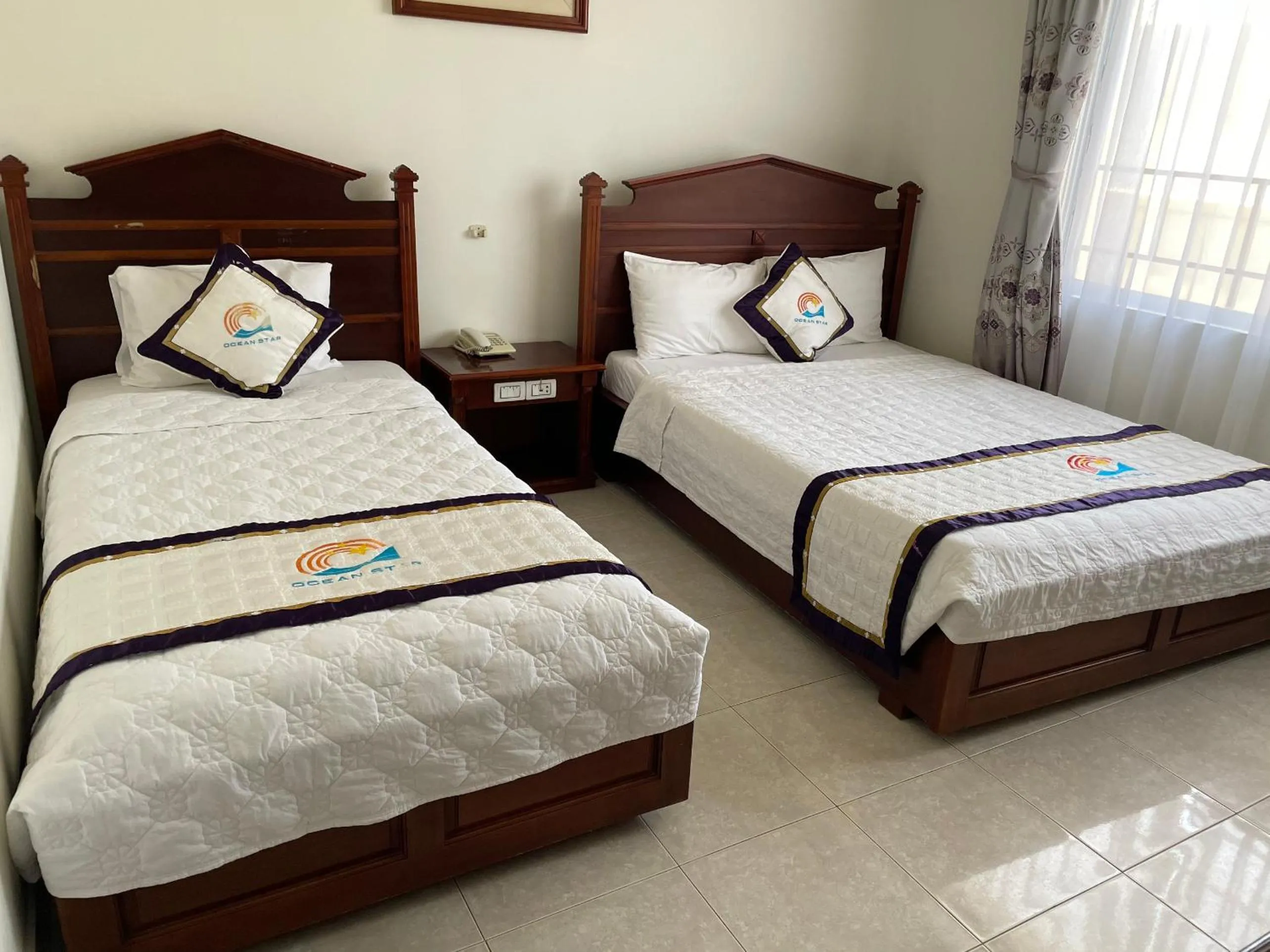 Bed in Ocean Star Hotel