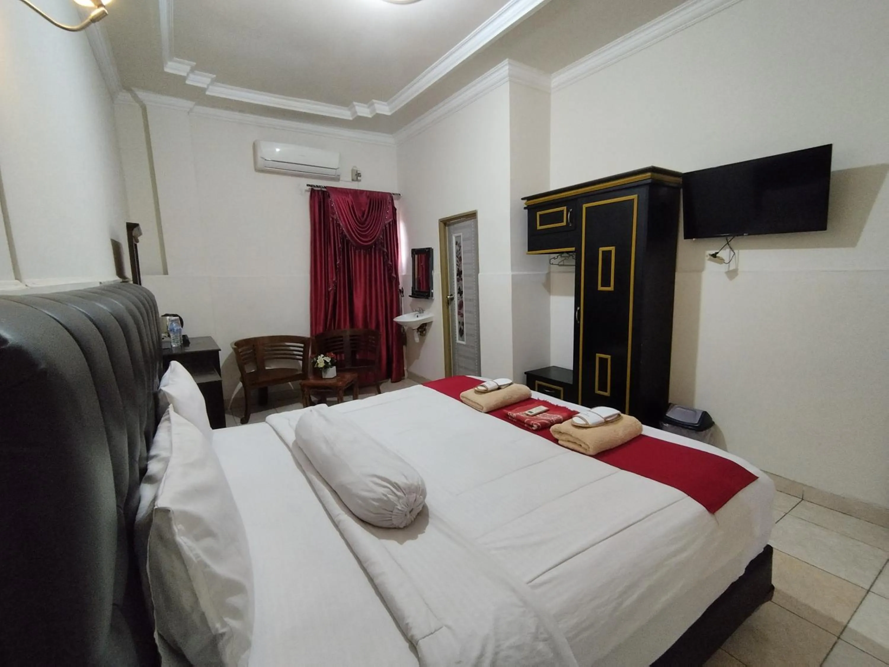 Bedroom in Hotel O My Kost Syariah
