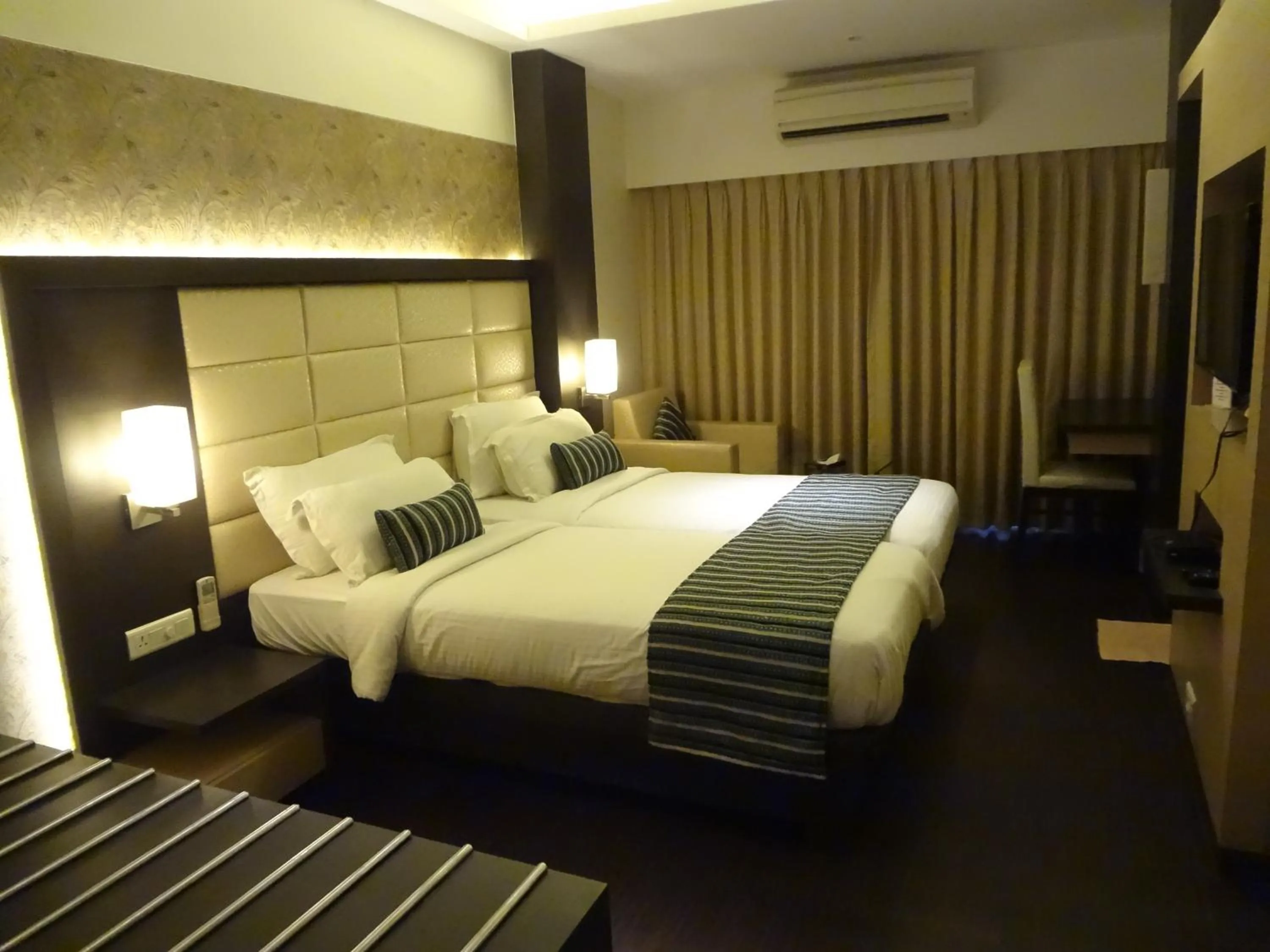 Bedroom, Bed in Galaxy Beacon Hotel, Santacruz ,Mumbai