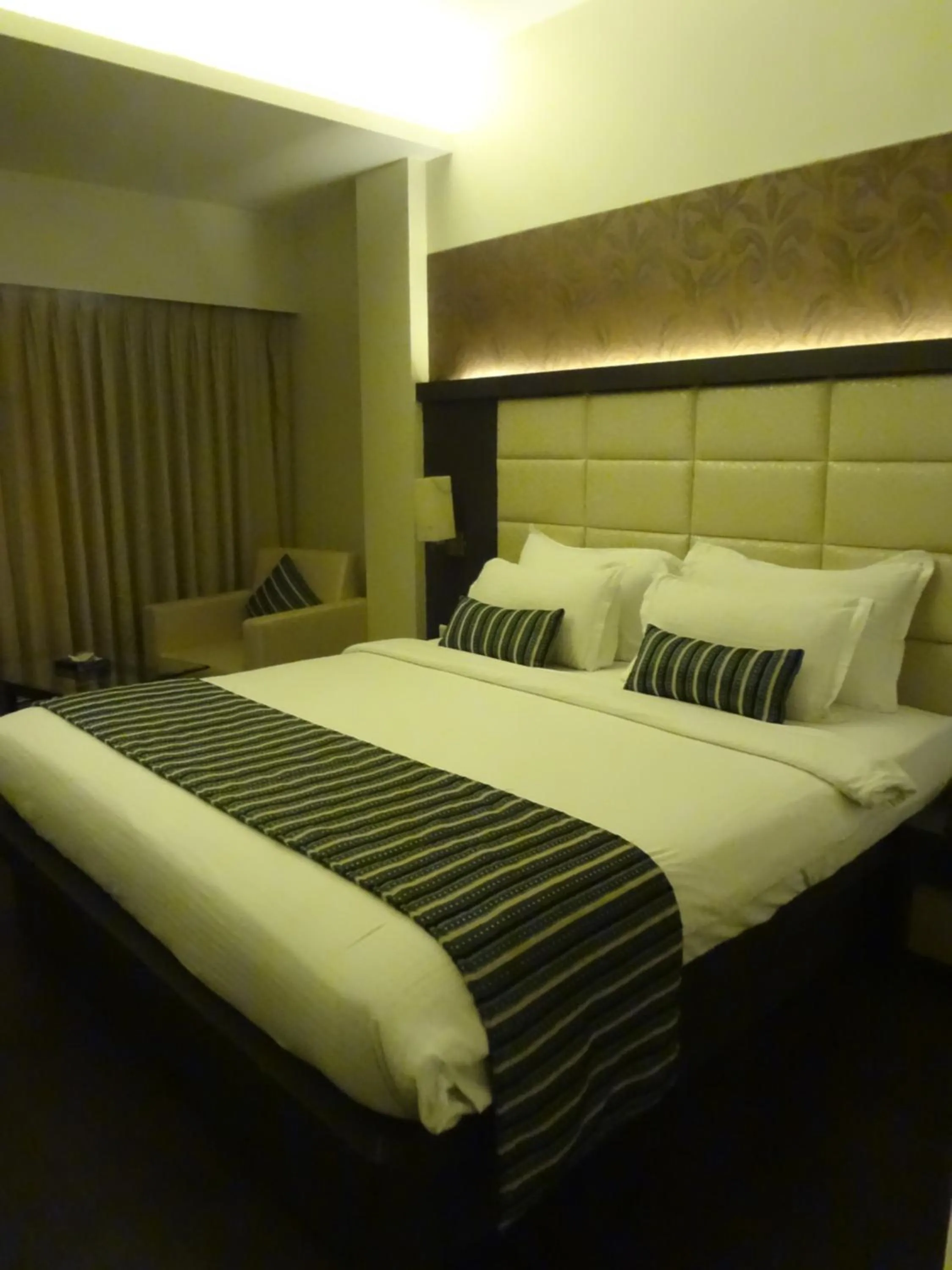 Bedroom, Bed in Galaxy Beacon Hotel, Santacruz ,Mumbai