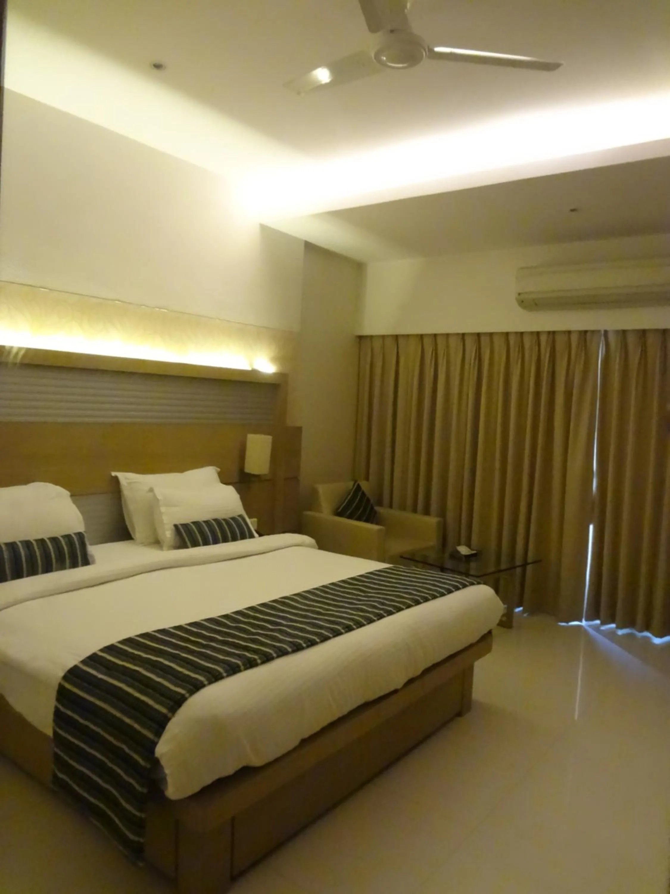 Bedroom, Bed in Galaxy Beacon Hotel, Santacruz ,Mumbai