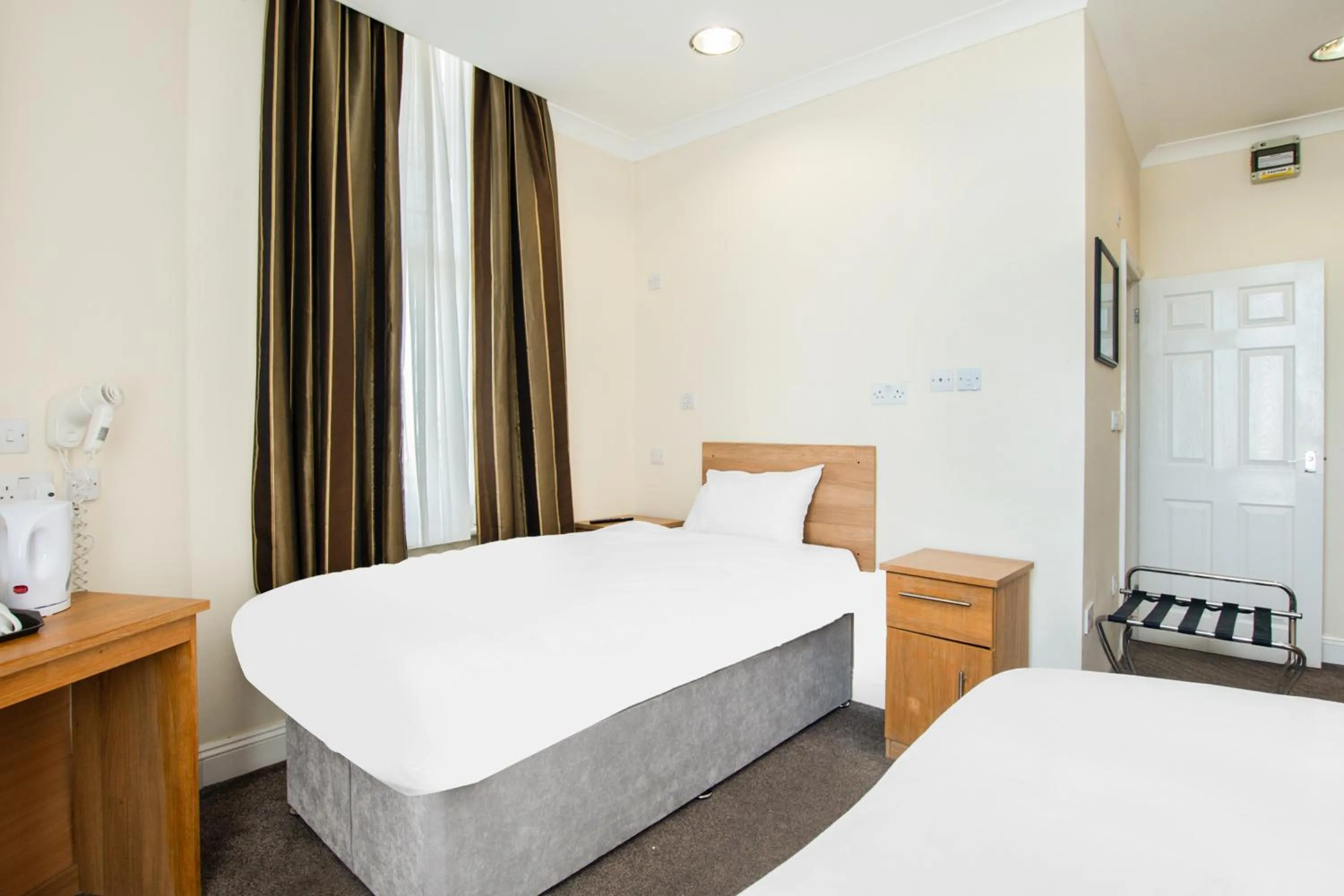 Bedroom, Bed in Russel Court Hotel Bournemouth Central