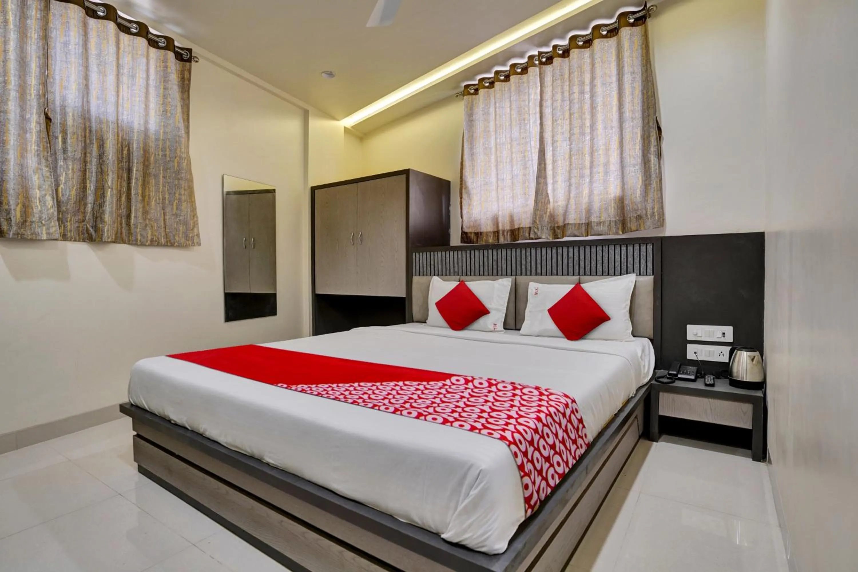 Bedroom in Hotel O Dhiman Residency