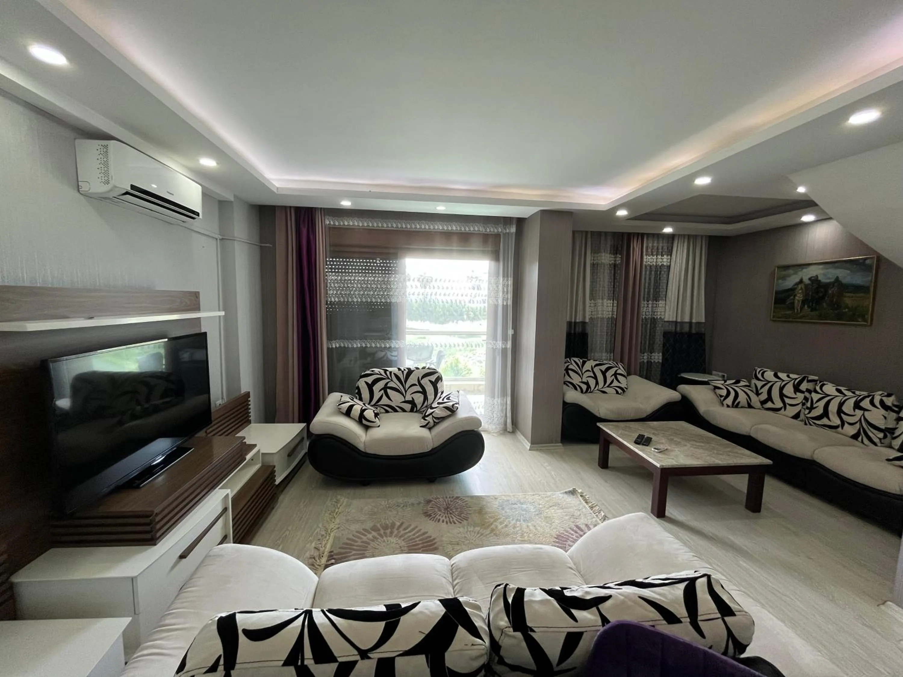 Communal lounge/ TV room, Bed in Gardenya Lara Suit Hotel