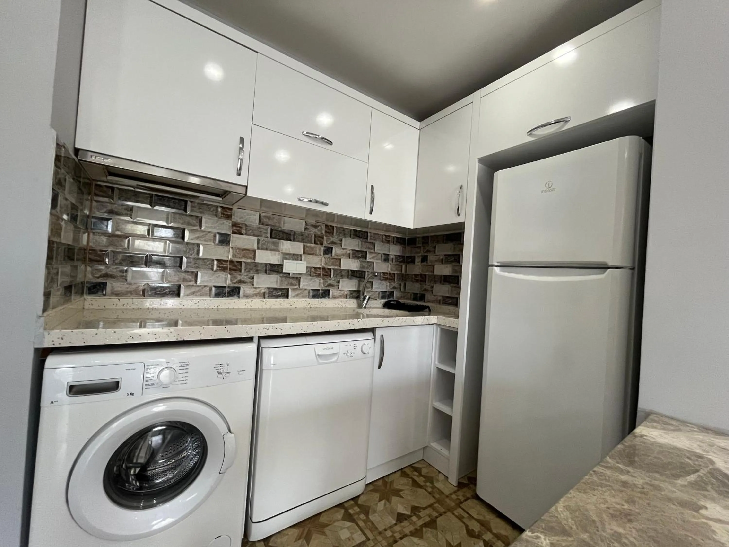 Kitchen or kitchenette in Gardenya Lara Suit Hotel