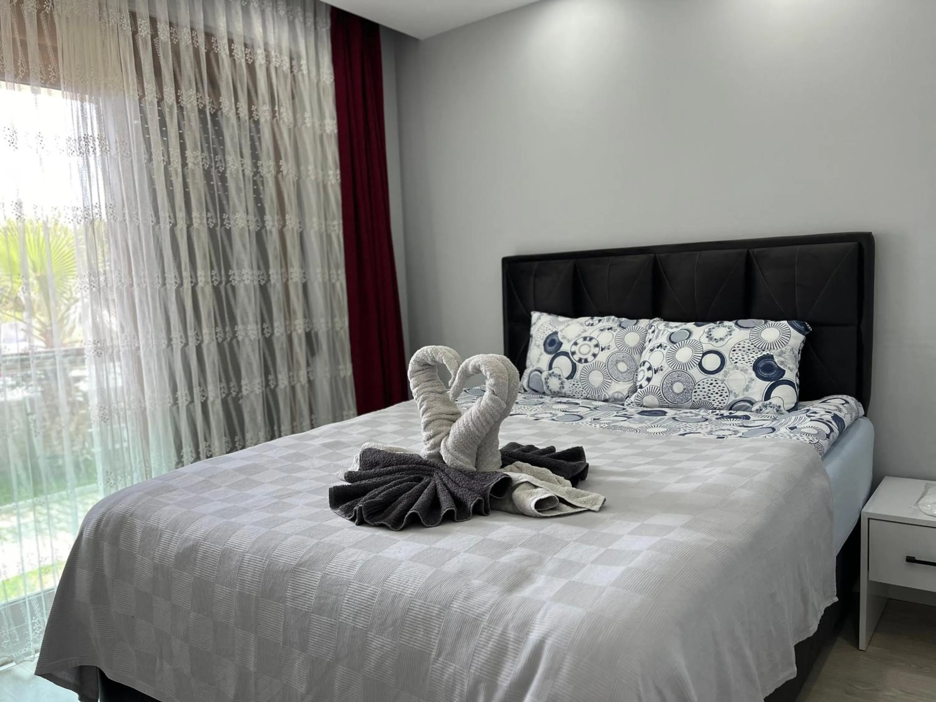 Bed in Gardenya Lara Suit Hotel