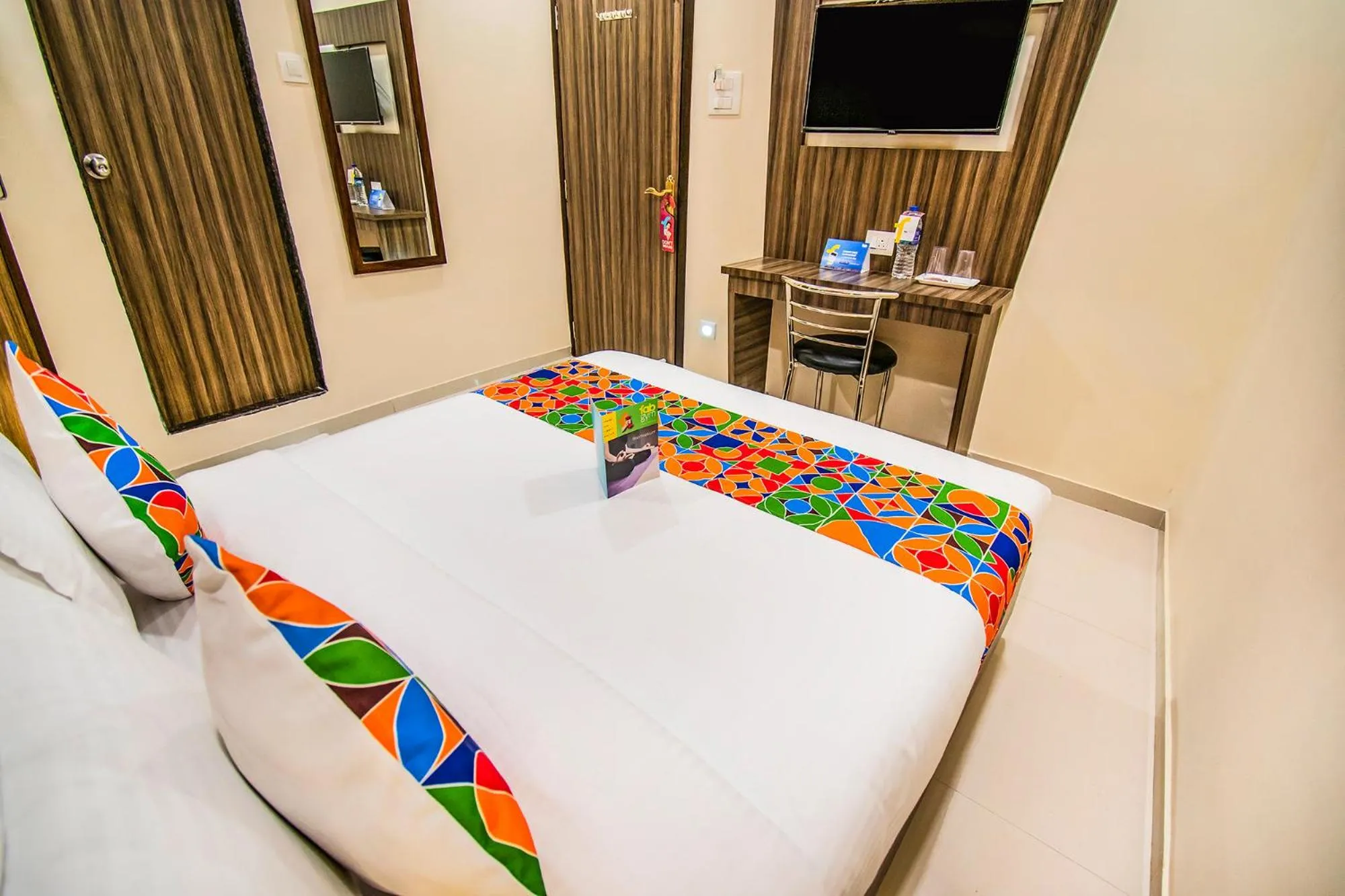 Bed in FabHotel Orange Suites - Nr Mumbai International Airport