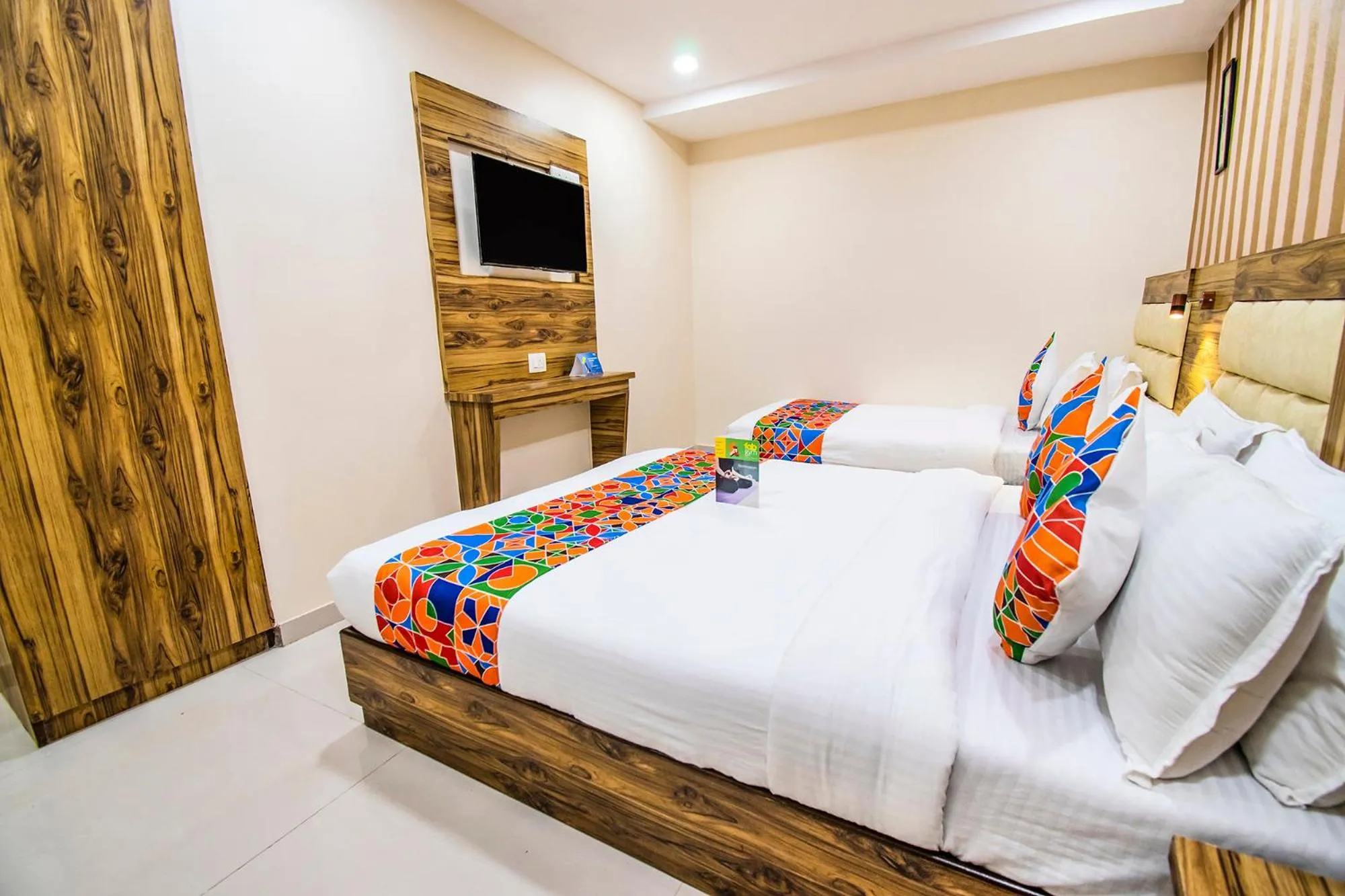 Bed in FabHotel Orange Suites - Nr Mumbai International Airport