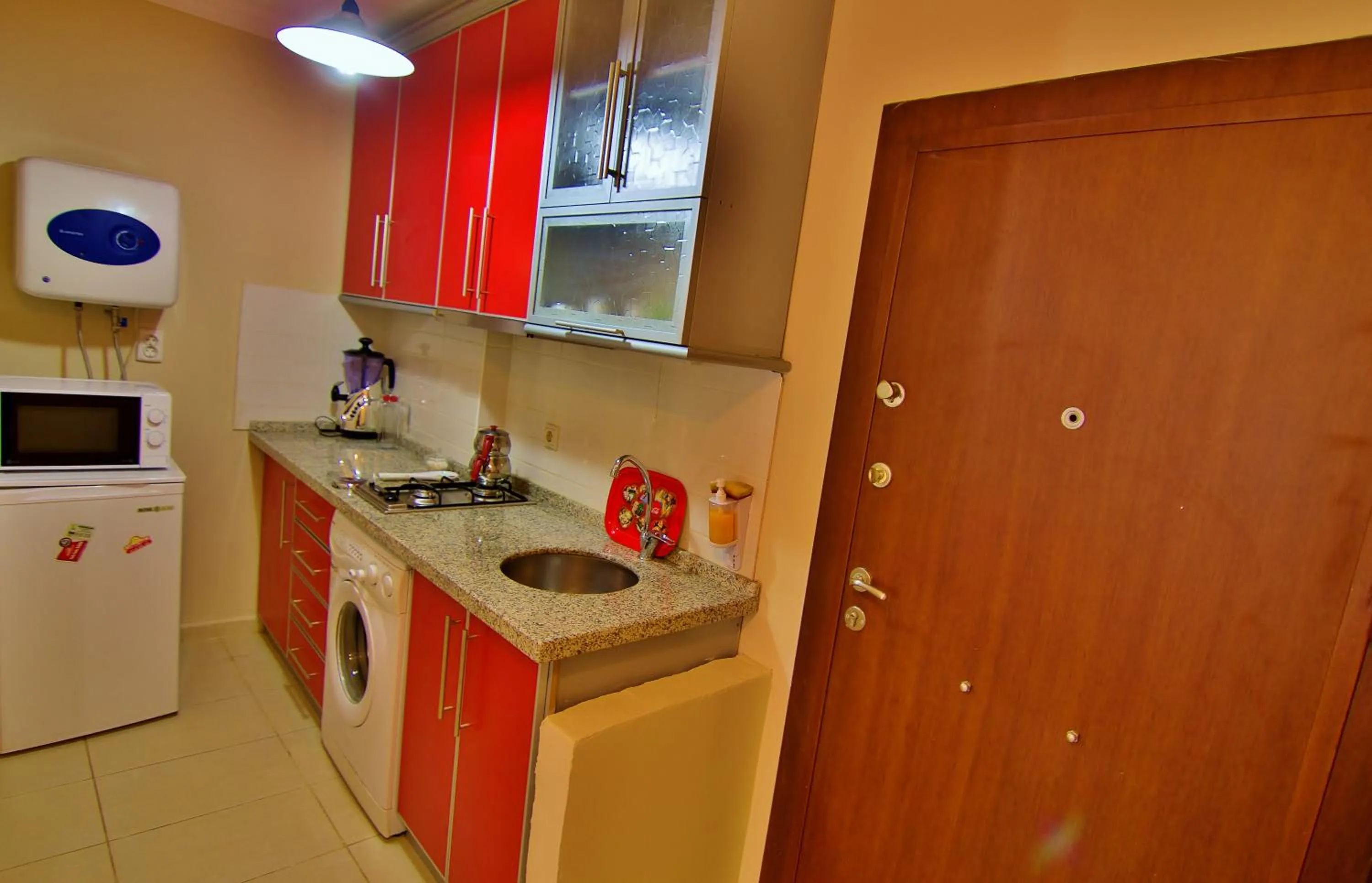 Kitchen or kitchenette in The City Residence Hotel