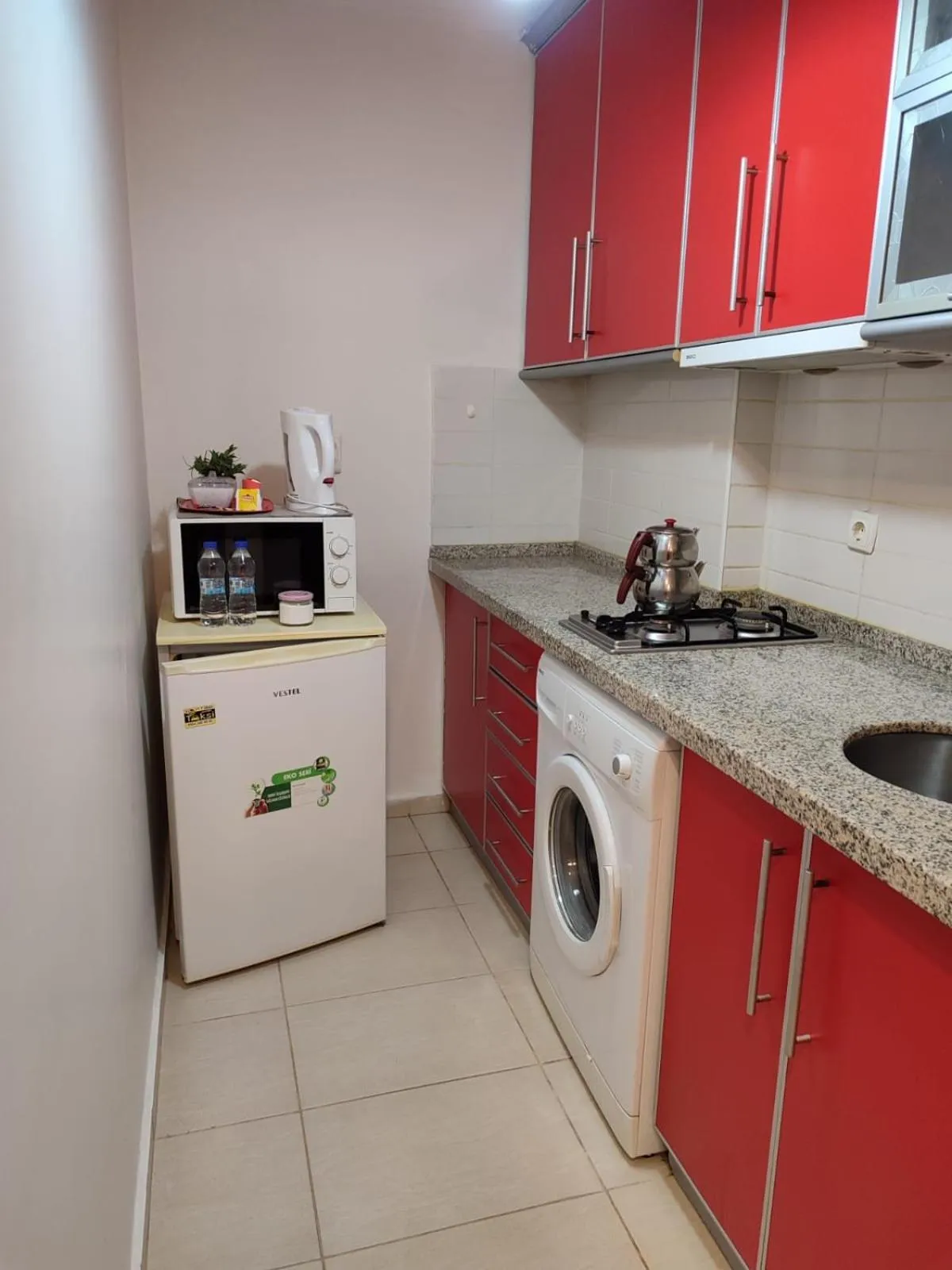 Kitchen or kitchenette in The City Residence Hotel