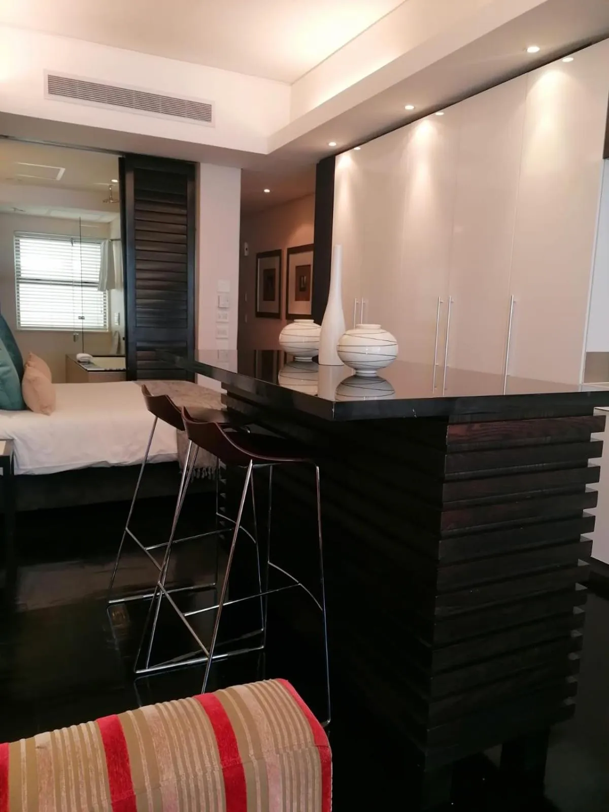 Seating area, Bed in Mandela Rhodes Place